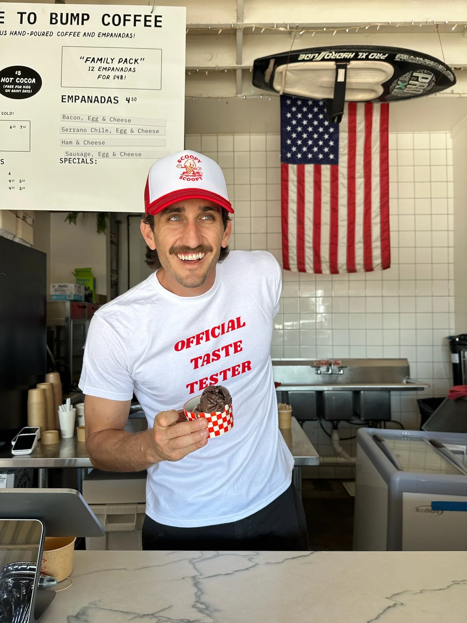 Scoopy founder serving super premium ice cream at catering setup in San Diego