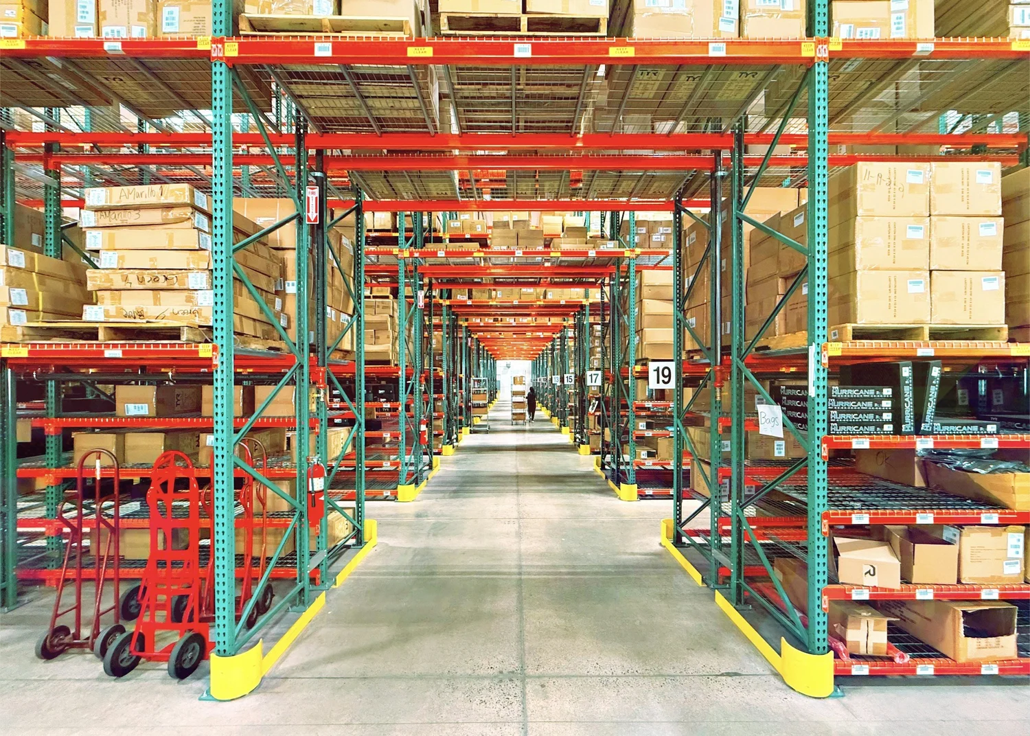 A distribution warehouse with organised storage and clear routes