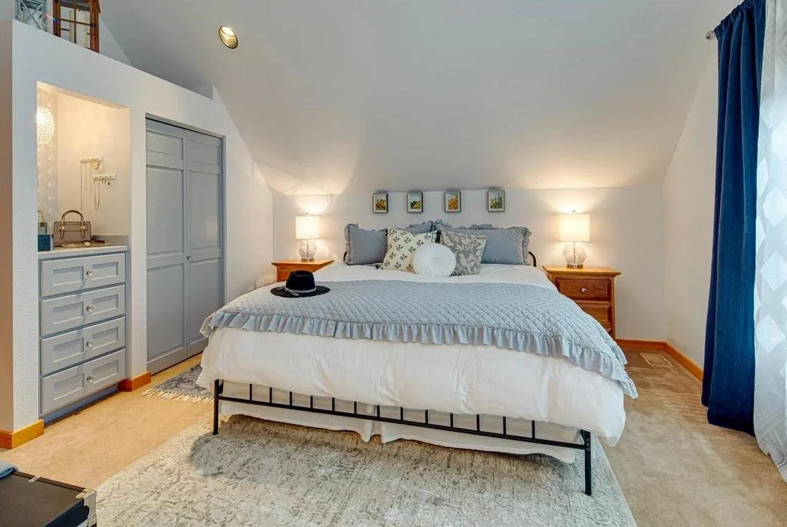 Cozy bedroom designed in cream and light blue colors