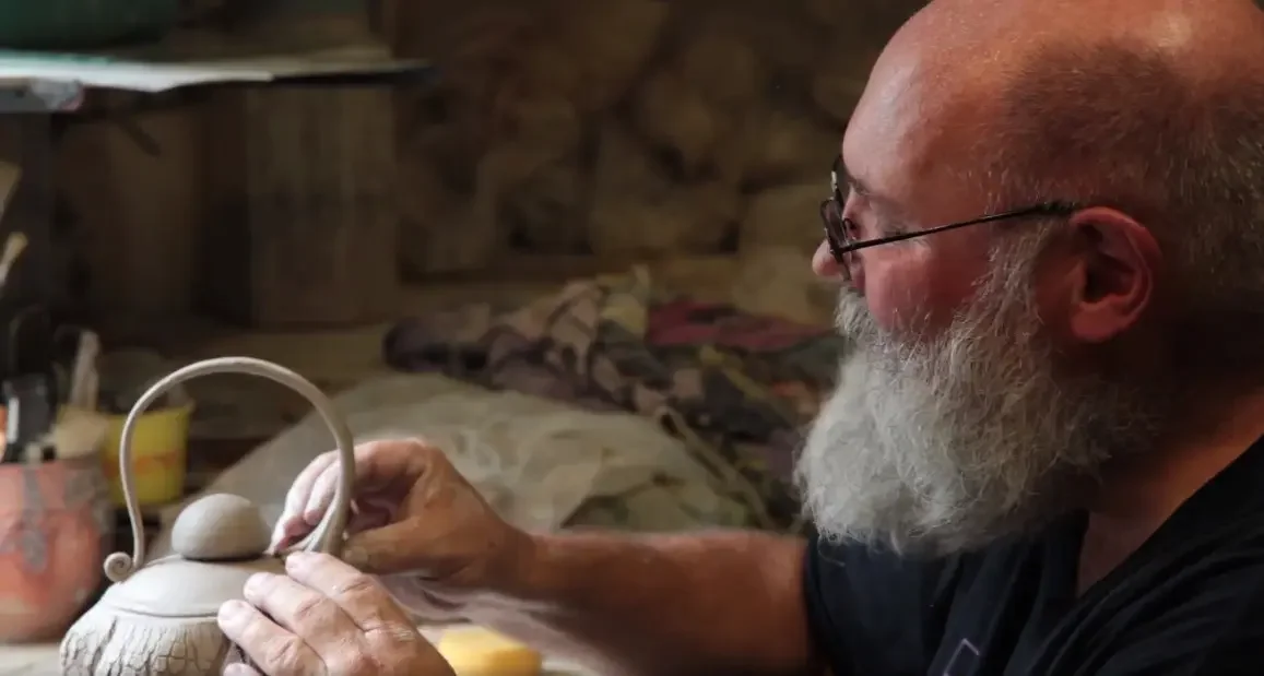 John Kellum working in his studio