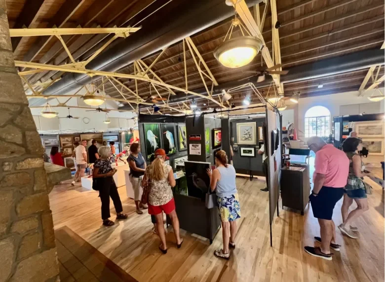 Artists displaying their work at Fine Art at the Magnolia in Lakeland, Florida