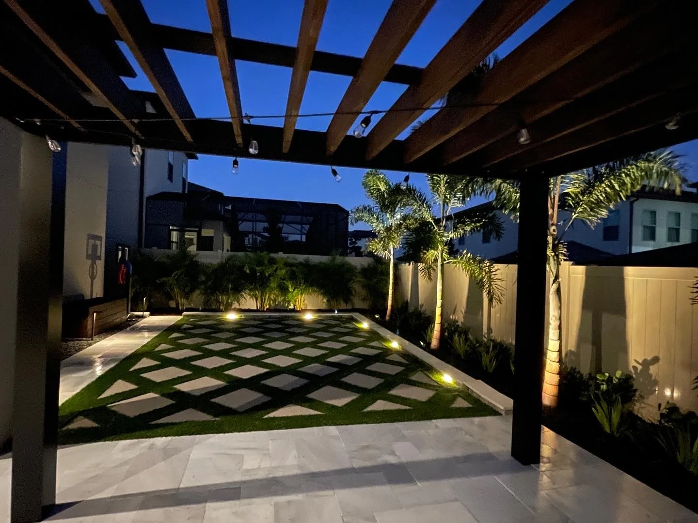 Hamlin, Clermont, Minneola, Winter Garden Landscape Contractors Landscaper Winter Garden Florida Pavers & Travertine with Palm trees and Outdoor Lighting