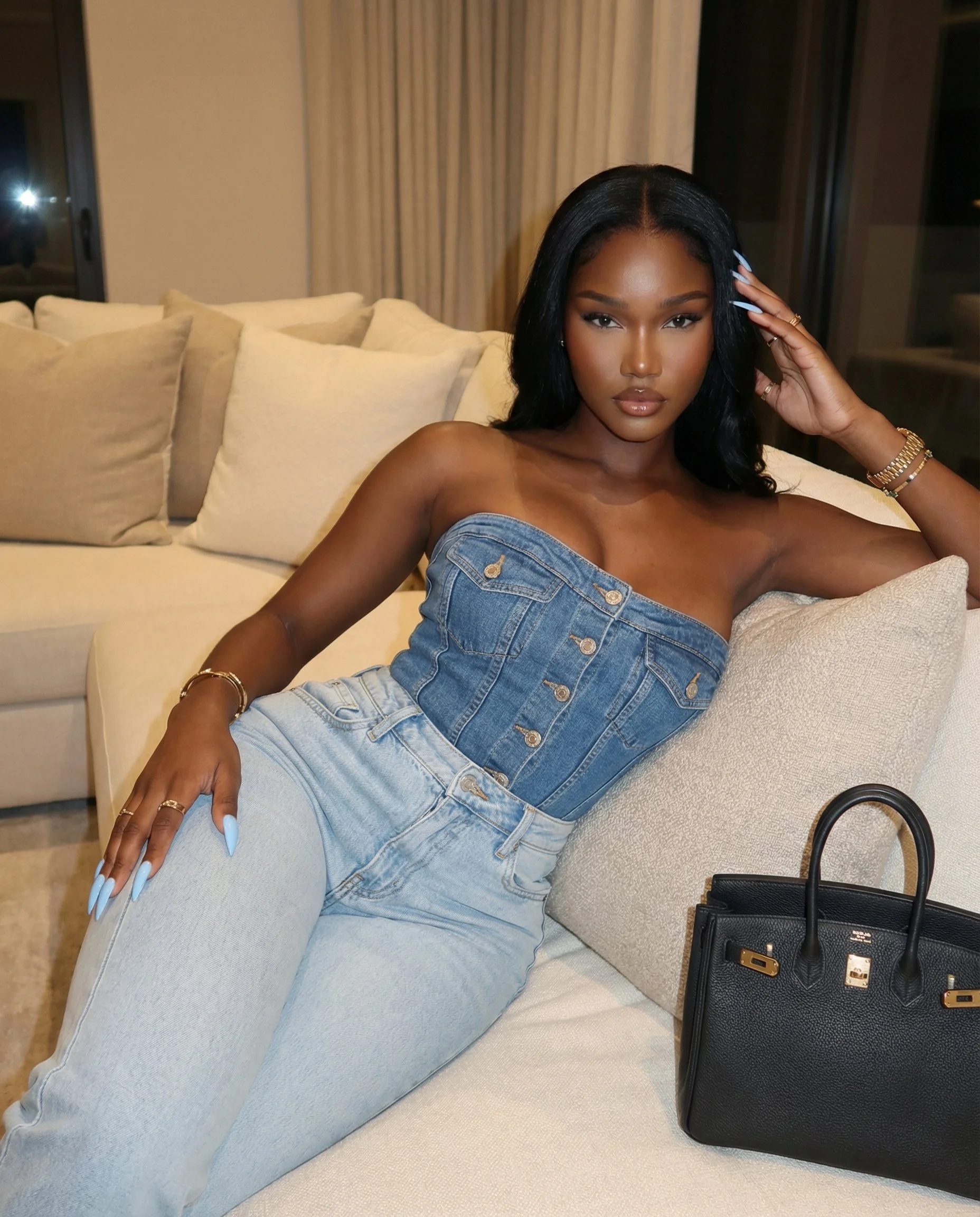 AI-generated realistic influencer avatar of a woman indoors wearing a denim top and jeans, created using a copy-paste AI avatar prompt.