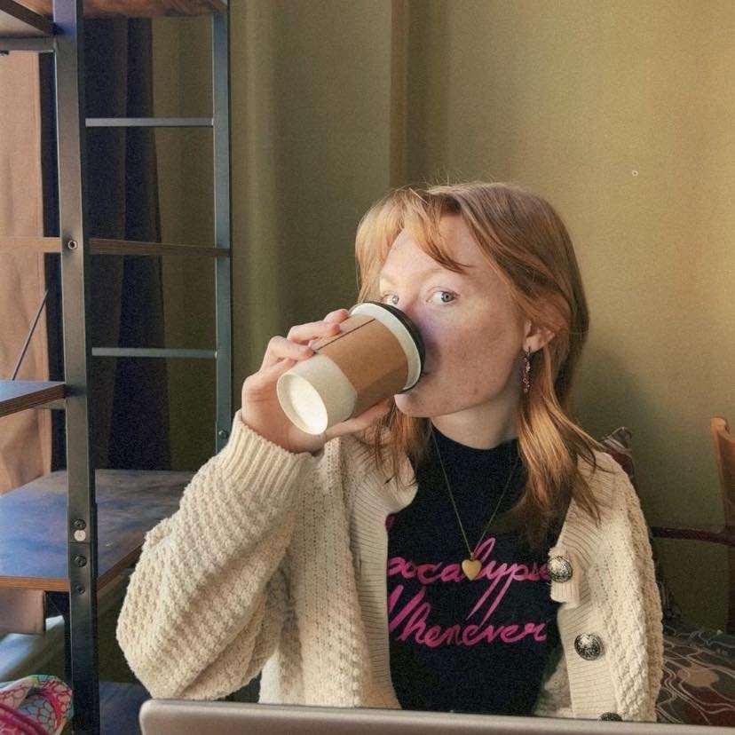 Zoe, stylist at Sage and Mane Mebane. Zoe specializes in vivid hair color, alt and emo hair cuts.