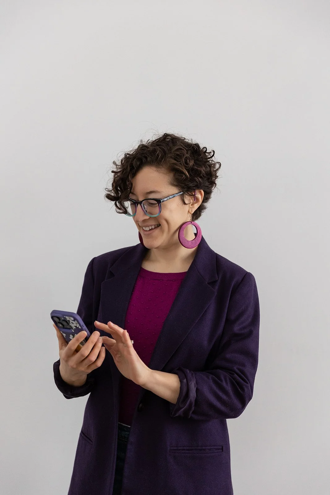 Lauren checking cell phone messages