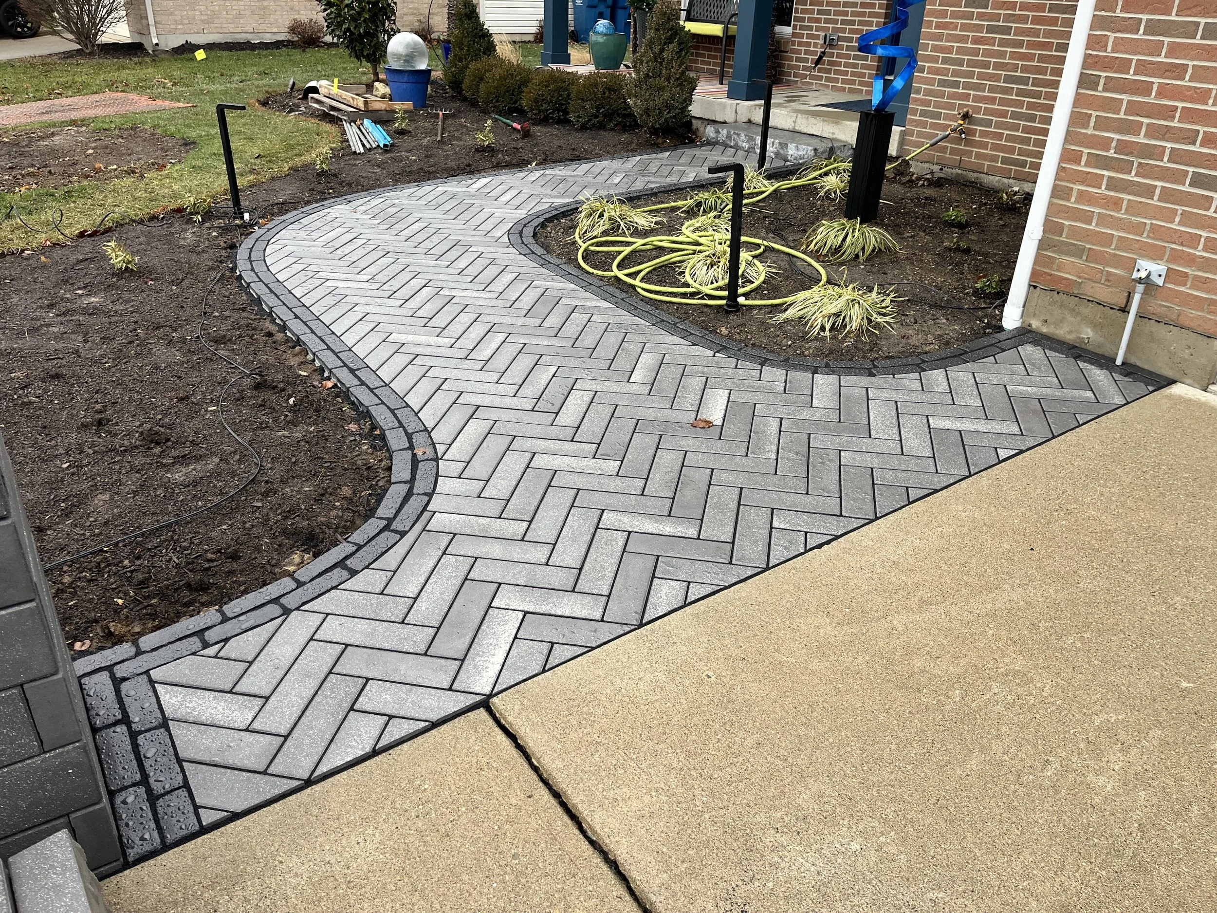 Cracked Concrete in Tipp City Replaced with Beautiful Pavers