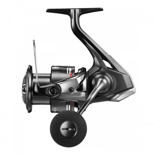 A black fishing reel with a handle and spool. Shimano Vanford