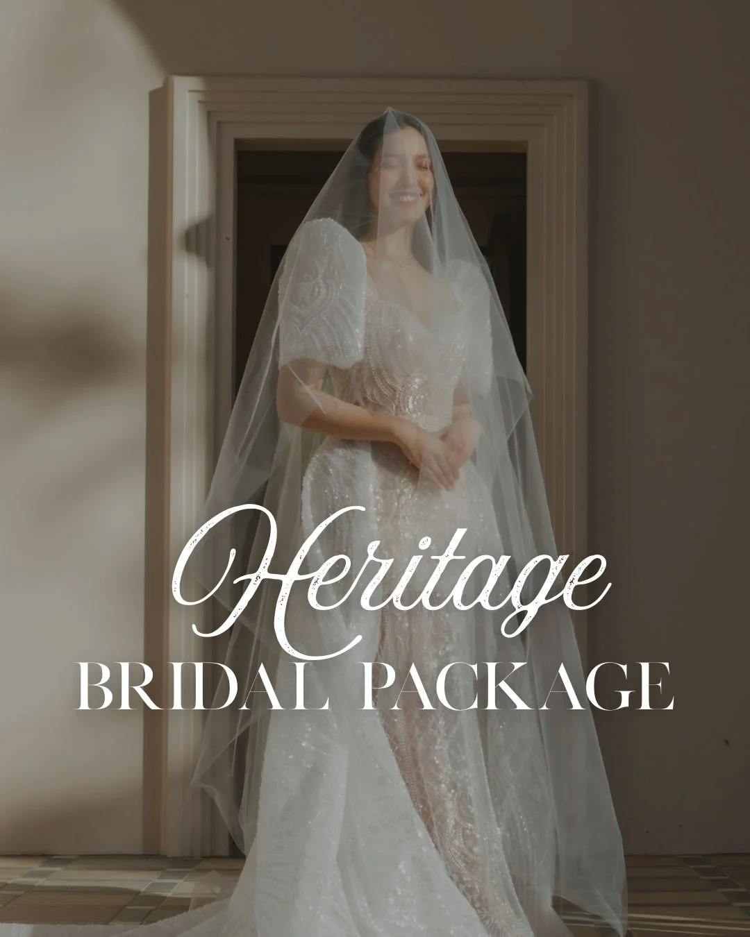 A woman in a wedding dress with a veil, standing in a doorway, smiling. Text overlay reads 'Heritage Bridal Package.'