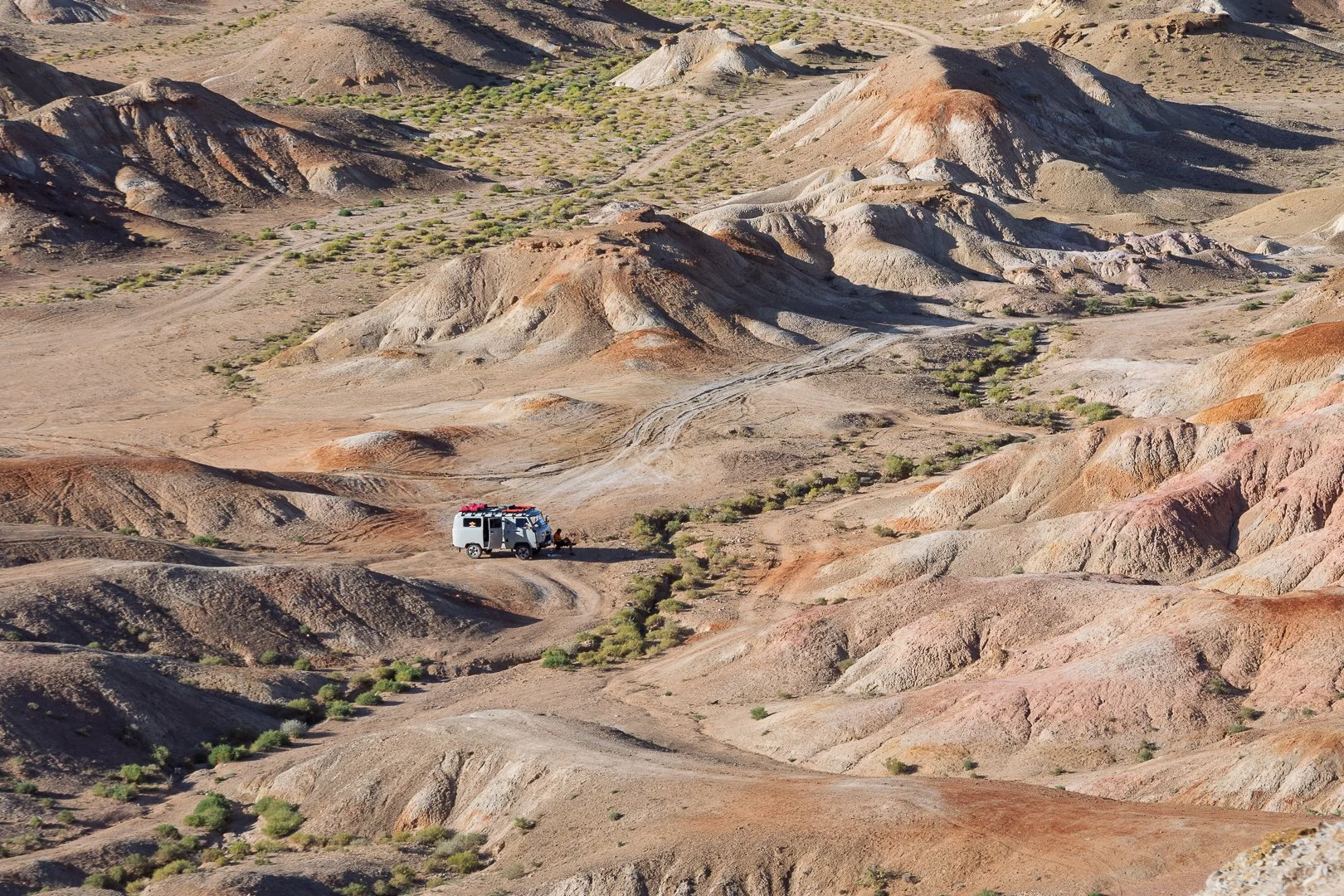 Van in desert landscape