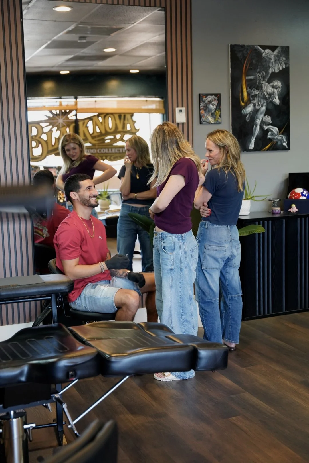 Tattoo artist working at Black Nova Tattoo Collective