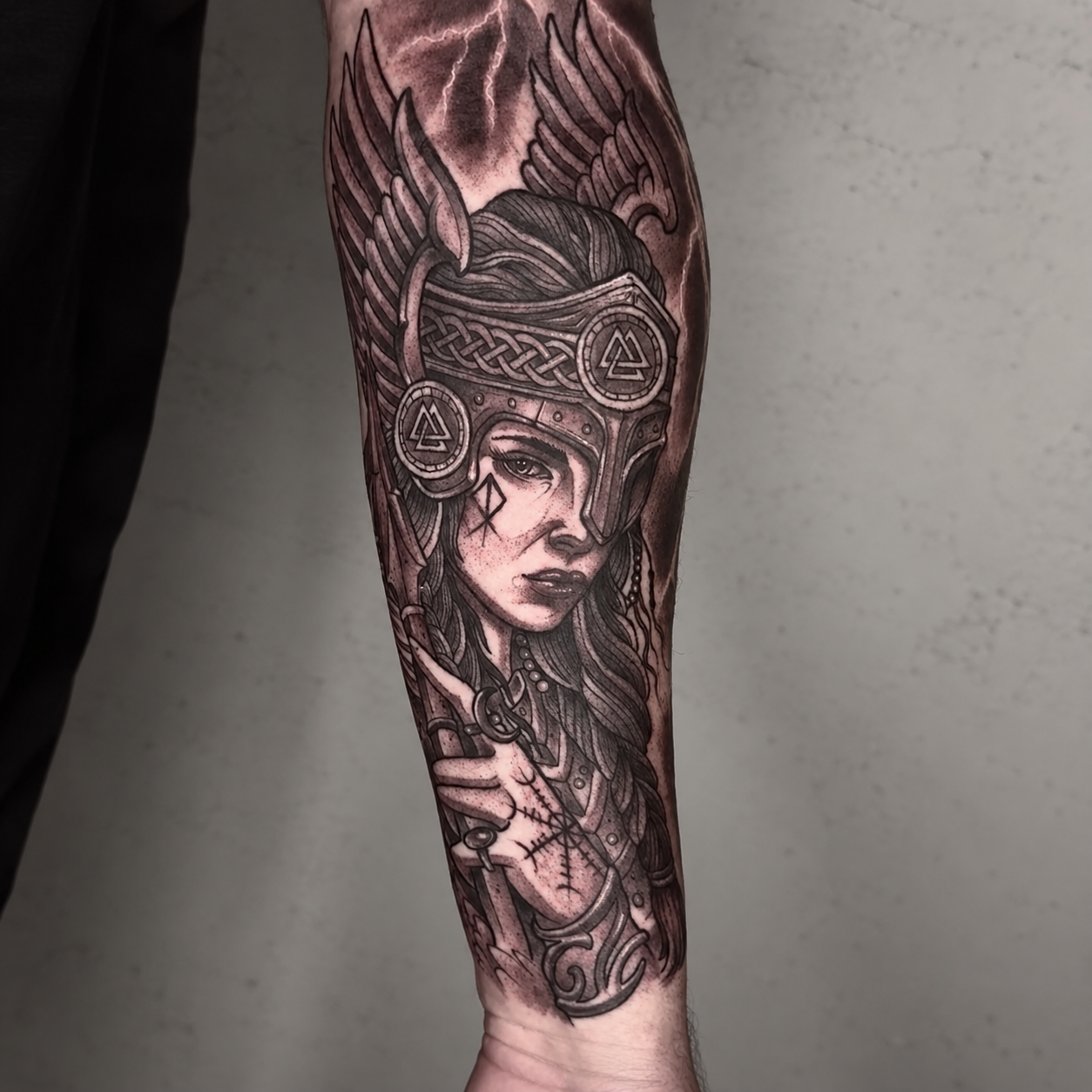 Black and grey ornamental leg tattoo by Adrian Aguirre.
