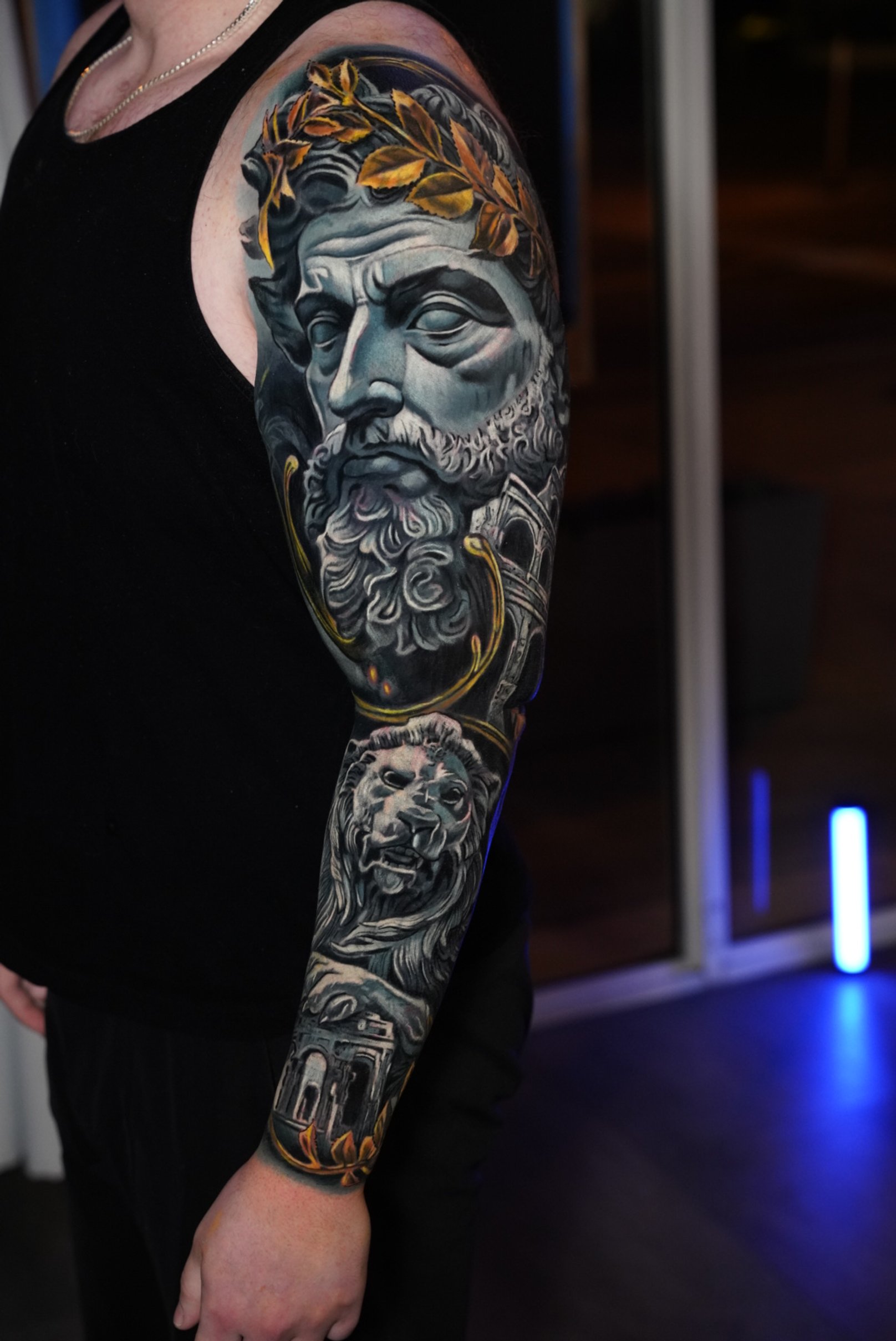 Black and grey realism sleeve inspired by classical mythology and sculptural forms.

Designed and executed as a large-scale tattoo using a structured layering technique, ideal for complex cover-up transformations and full sleeve projects.
