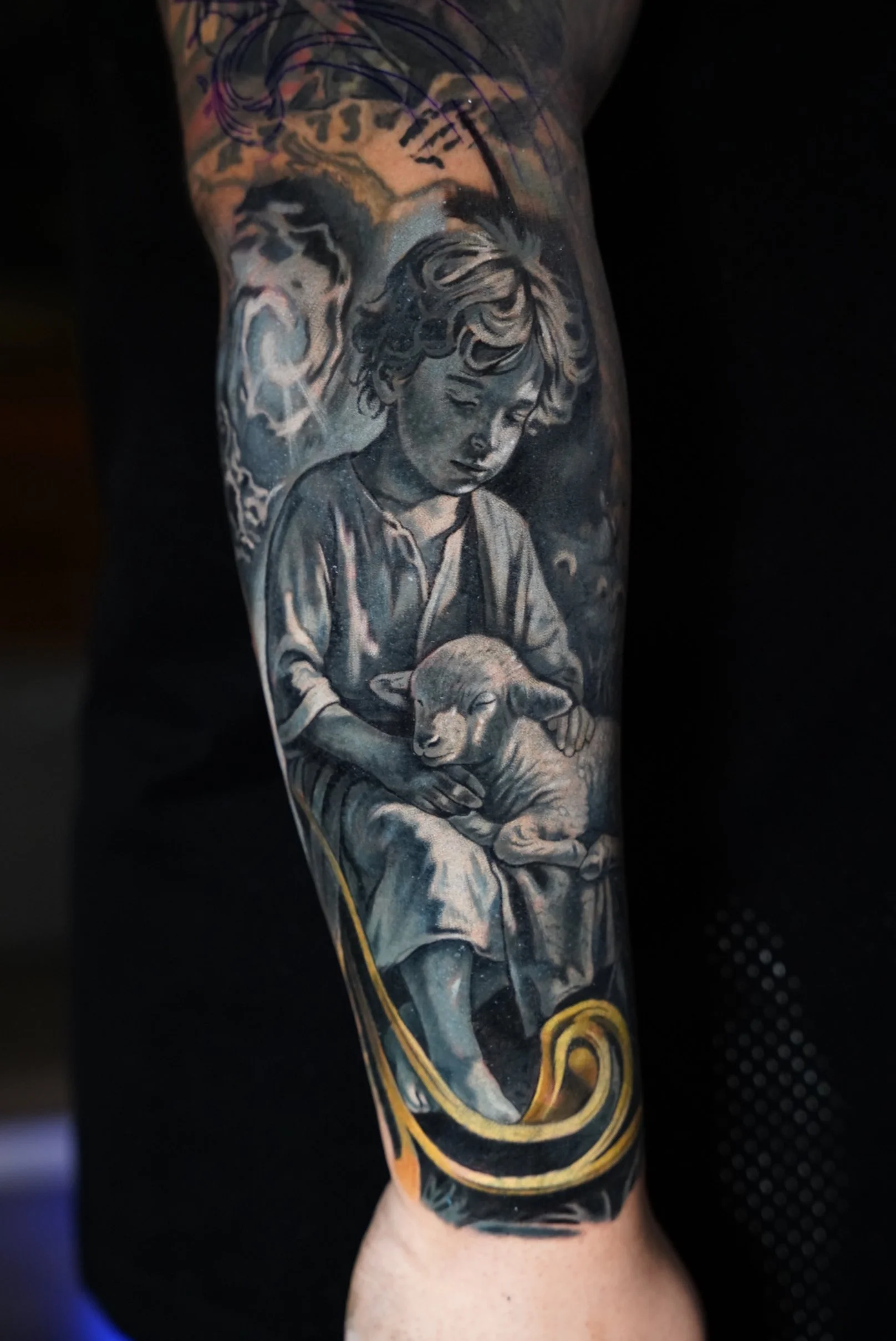 Emotional realism cover-up detail depicting innocence and protection. Soft textures, sculptural shading, and subtle contrast used to create depth and harmony within a large-scale sleeve composition.