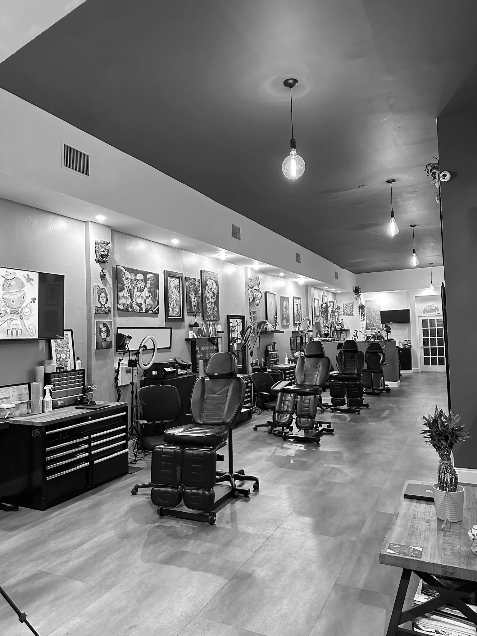 Interior of a professional tattoo studio focused on large-scale color cover up tattoo work.