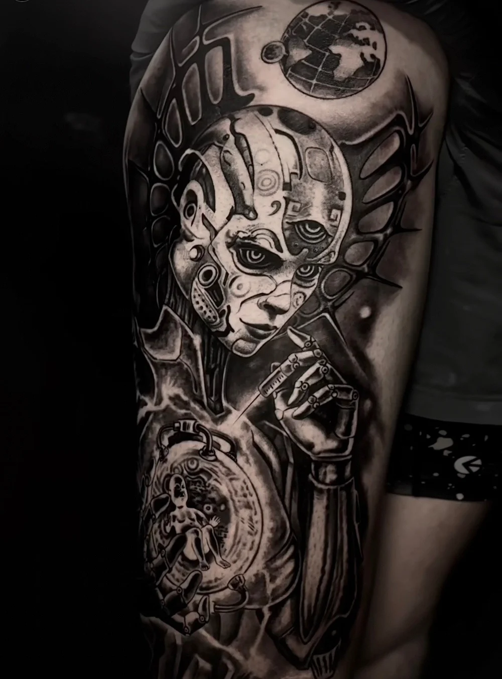 Black and grey biomechanical cyborg tattoo by Alexis Torres featuring a futuristic robotic female with intricate mechanical details at Black Nova Tattoo Collective in Miami.