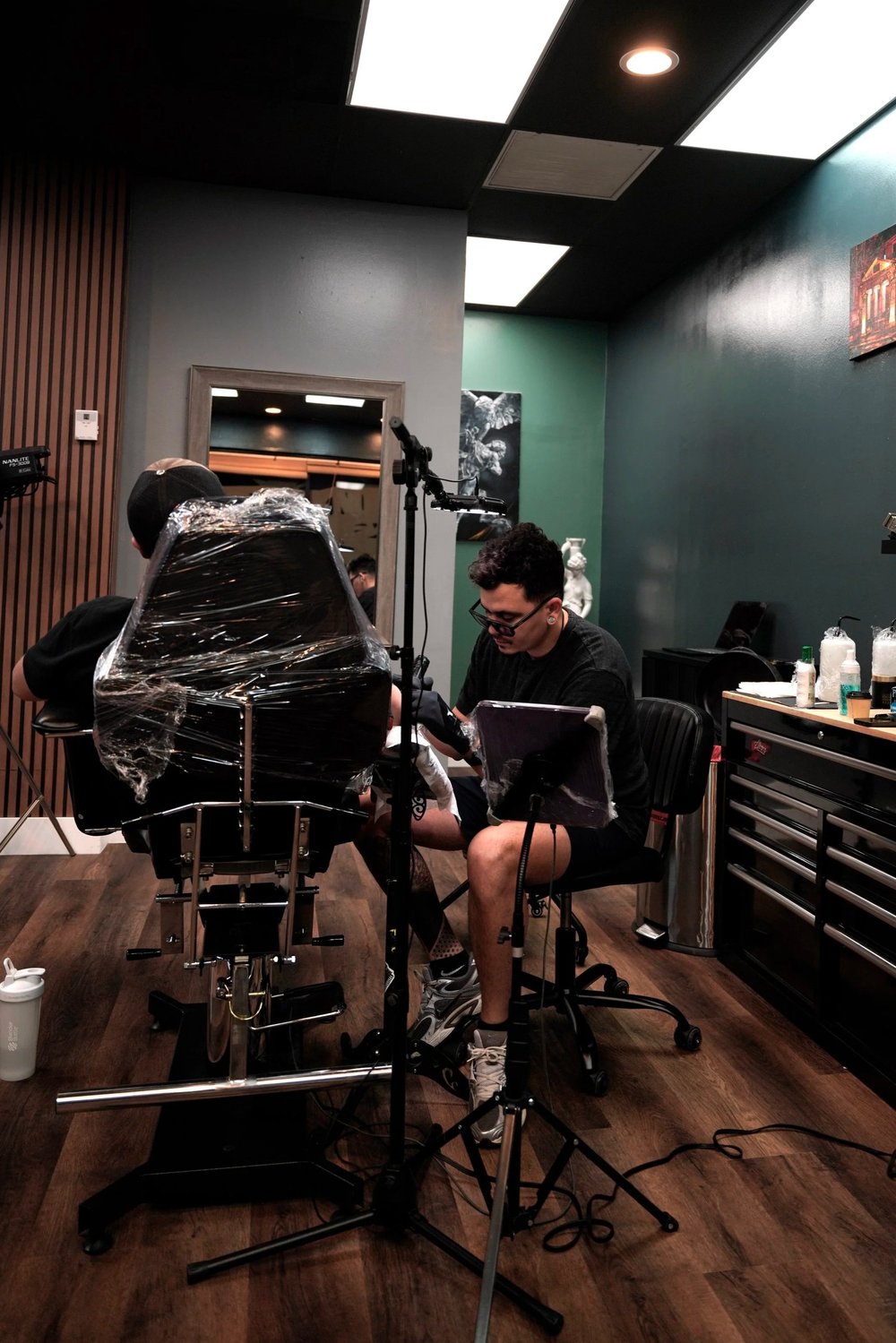 Yorlandi Fabregas working at Black Nova Tattoo Collective.