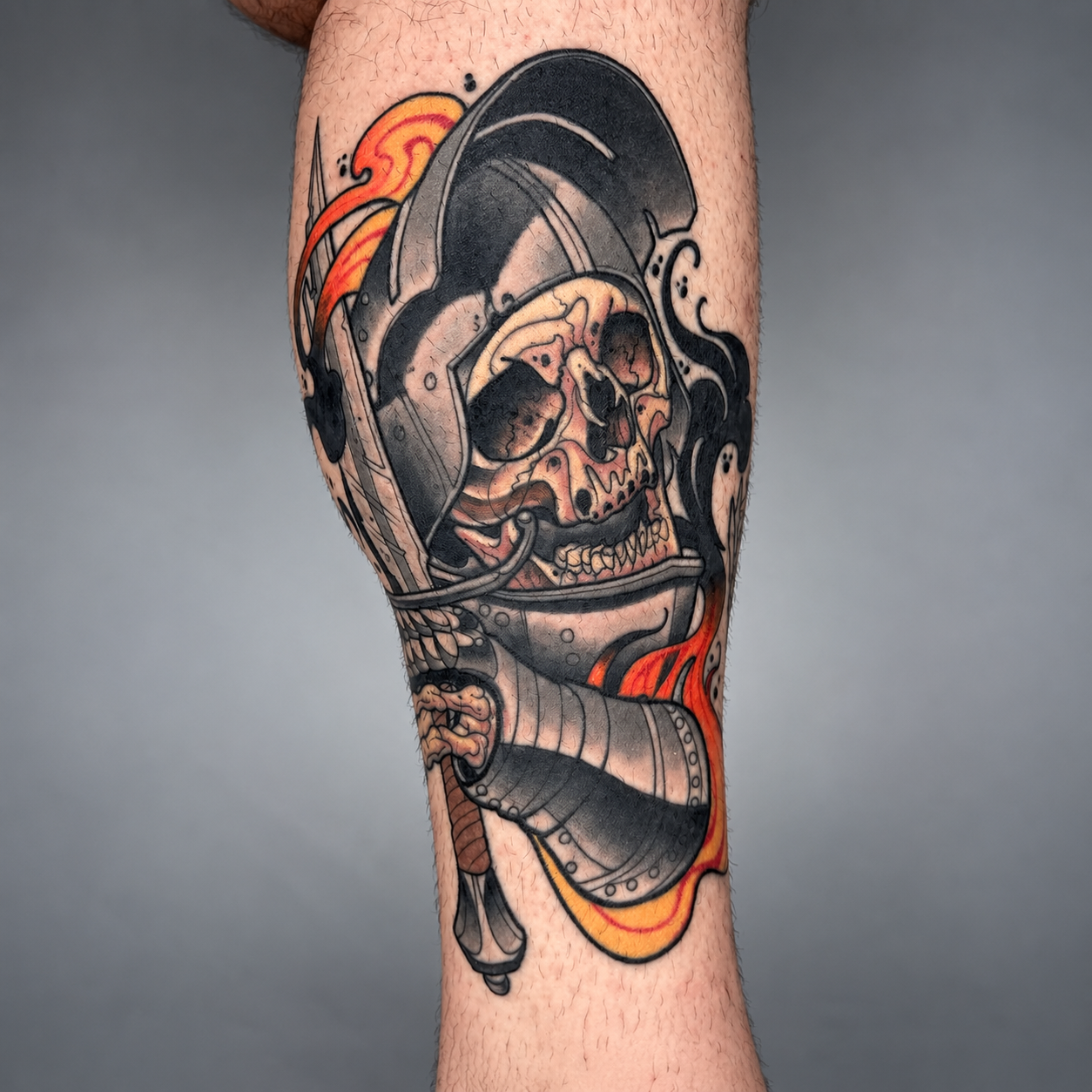 Color skull tattoo with an ornate helmet by Adrian Aguirre.