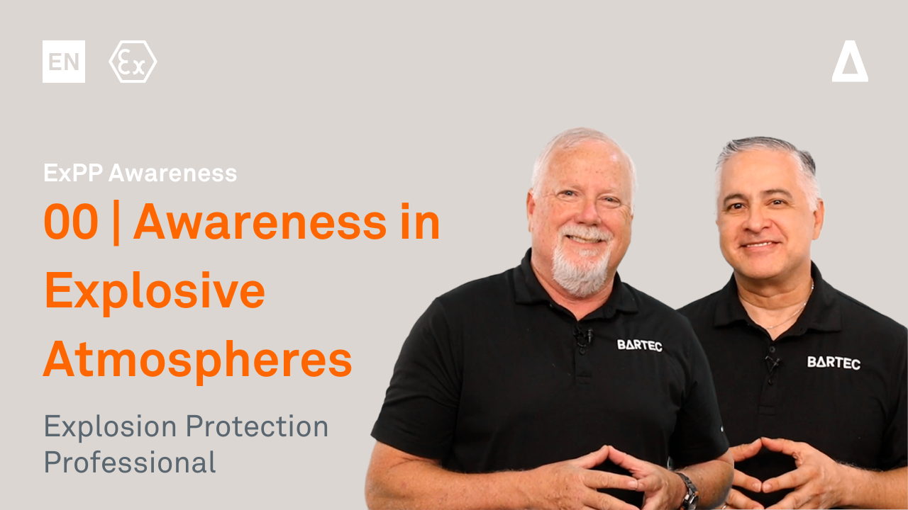 Two men in black collared shirts with 'BARTEC' logo, smiling, standing side by side against a gray background, promoting explosion protection awareness training.