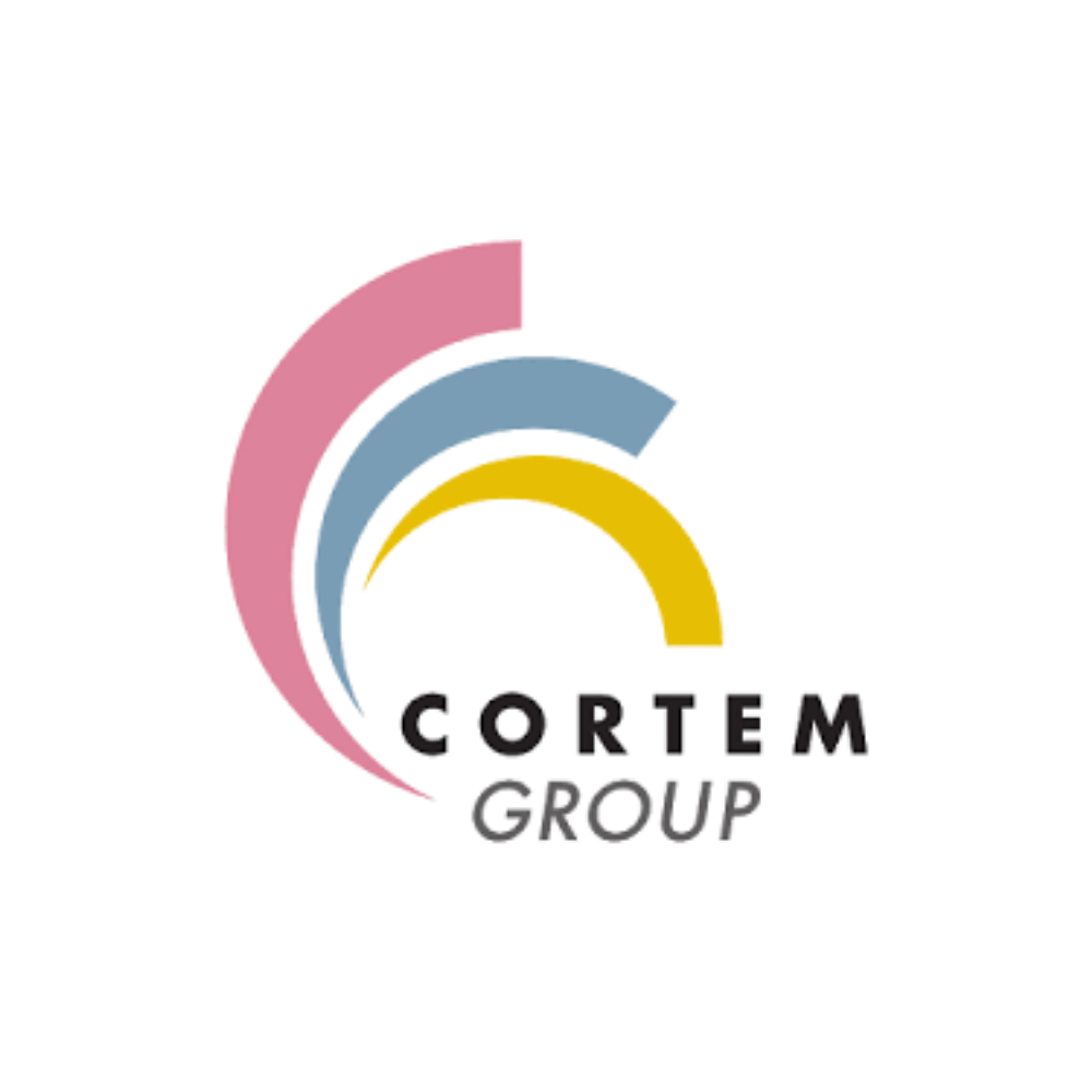 Stylized circular logo with the text 'Corey Group' beneath it, featuring colorful curved lines forming a spiral pattern.