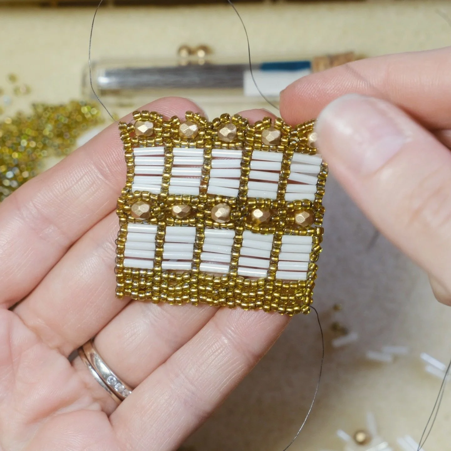 I started a new bead weaving project last night&mdash;The Corset Cuff from Beadwork Magazine 💎 Working with bugle beads is another first for me and love the effect in this odd-count peyote design. 😍 

If you want to come hang out while I work and c