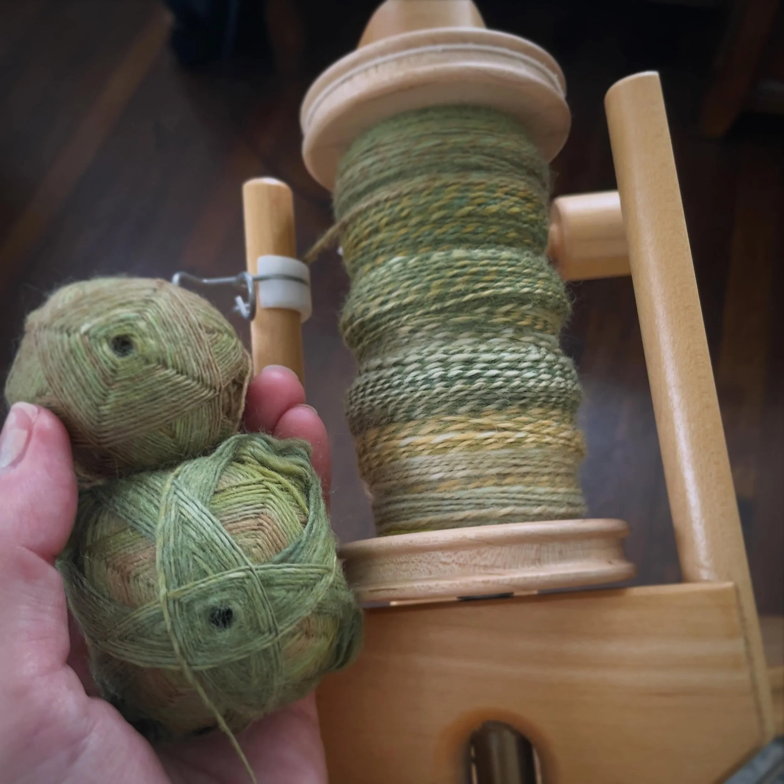 After a whole year, I finally got around to finishing this gorgeous hand-dyed fiber from @threewatersfarm &mdash; spun entirely on my Turkish spindle. 🥹 

Today I plied the turtles on my Lendrum wheel - It's a bit thick and thin but I'm still pretty