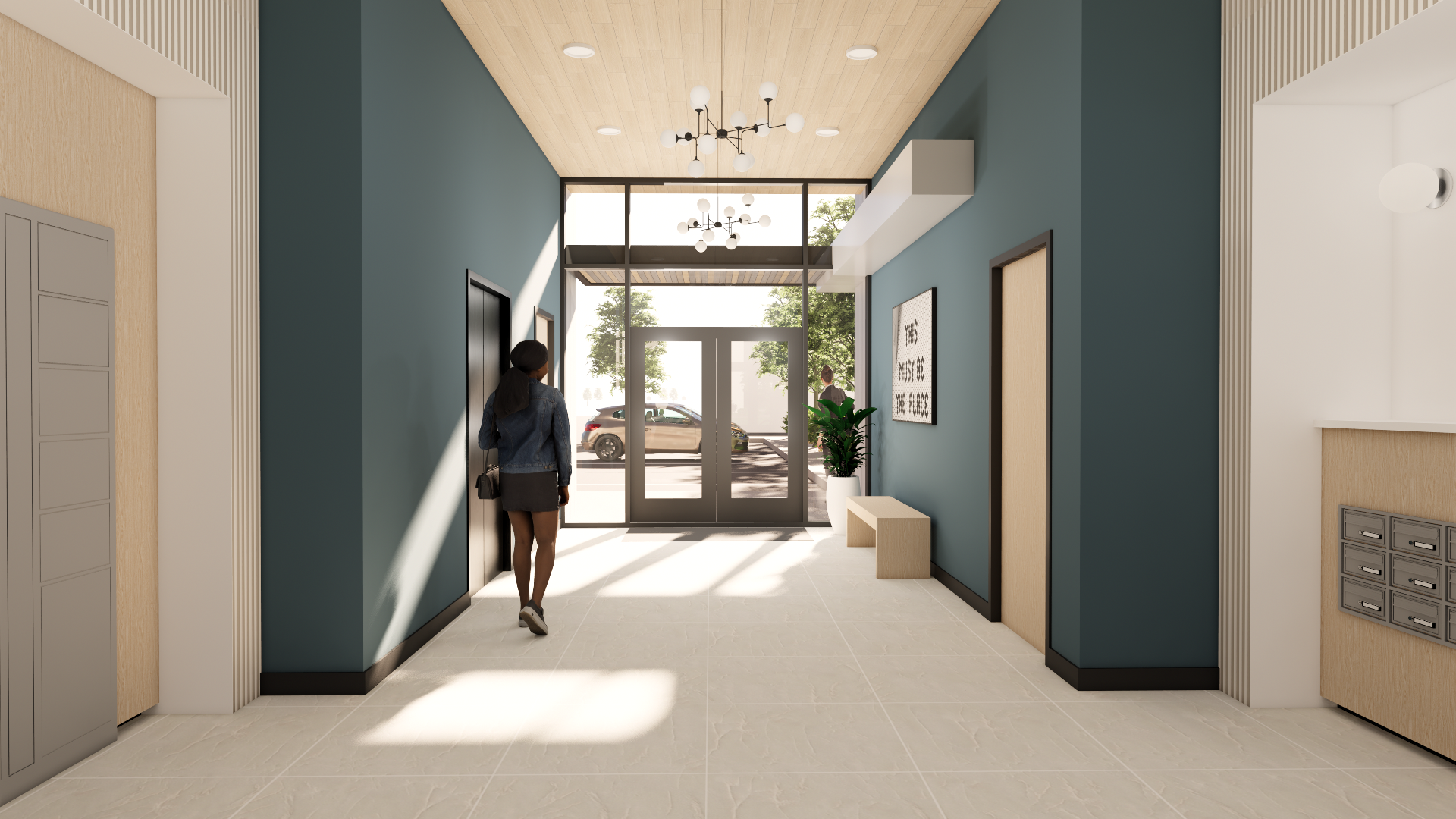 Modern building lobby with blue walls, wooden ceiling, large glass entrance doors, a woman walking inside, and ceiling lights.