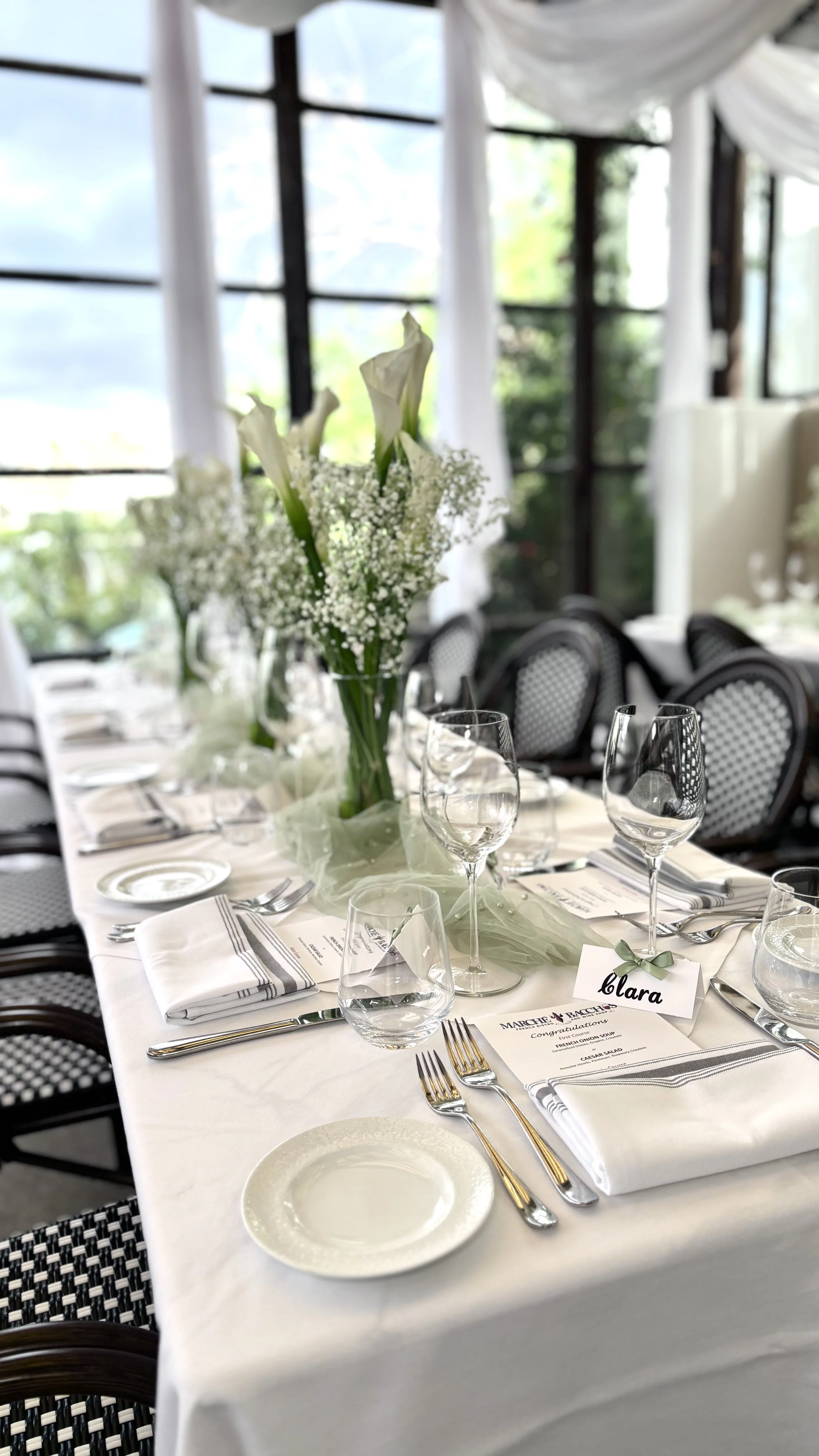 Elegant event tablescape with white floral centerpieces and luxury table décor designed by Marie Events in Las Vegas.