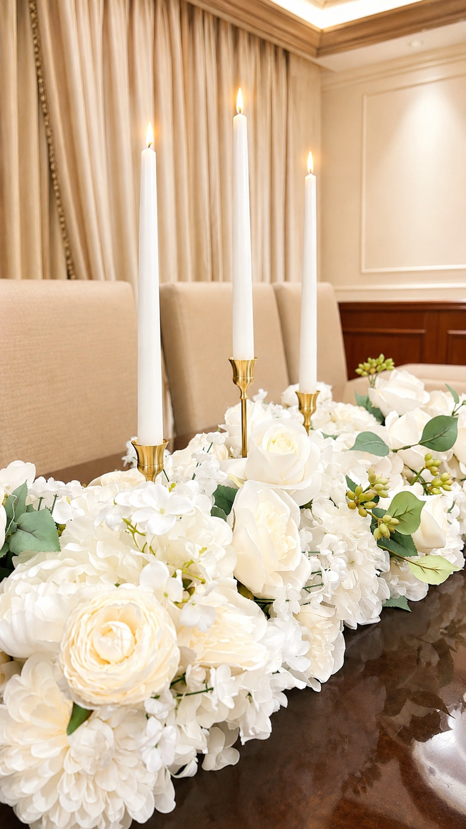 Luxury white floral centerpiece with elegant taper candles designed by Marie Events for an upscale event in Las Vegas.