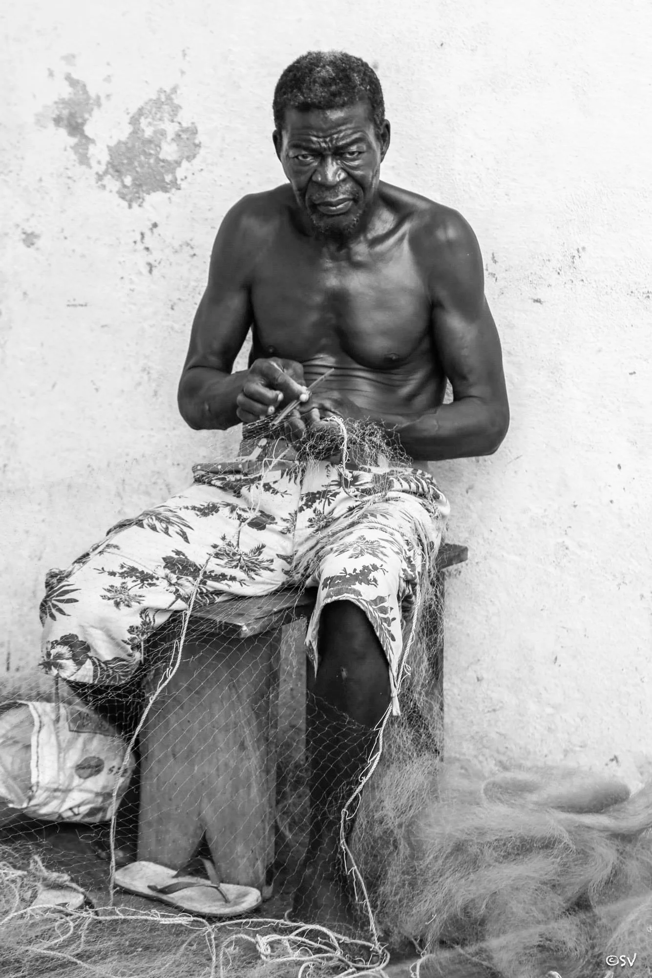 Mending the years gone by. (Cape Coast, Ghana)