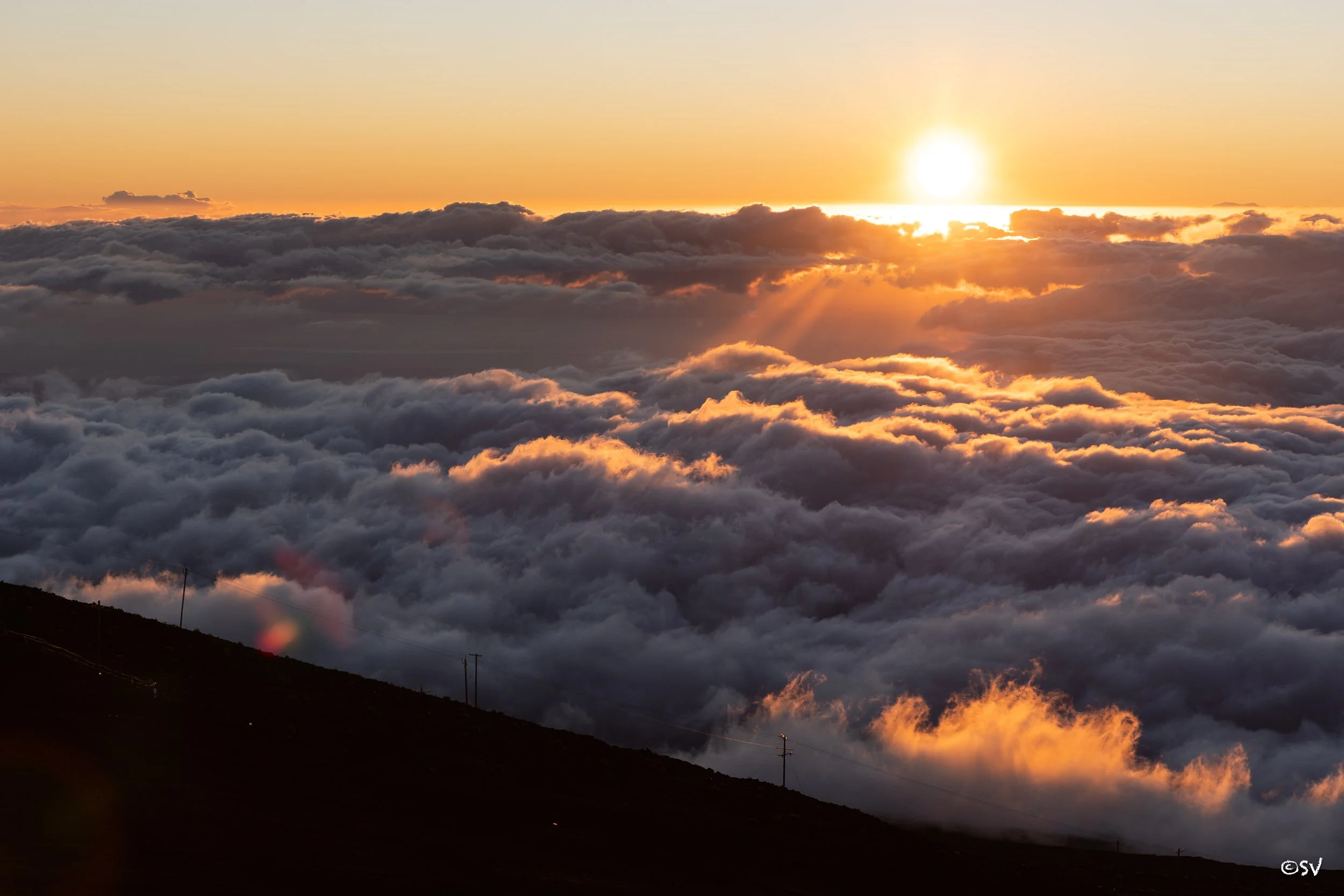 Where the sun sets above the clouds. (Haleakala, USA)