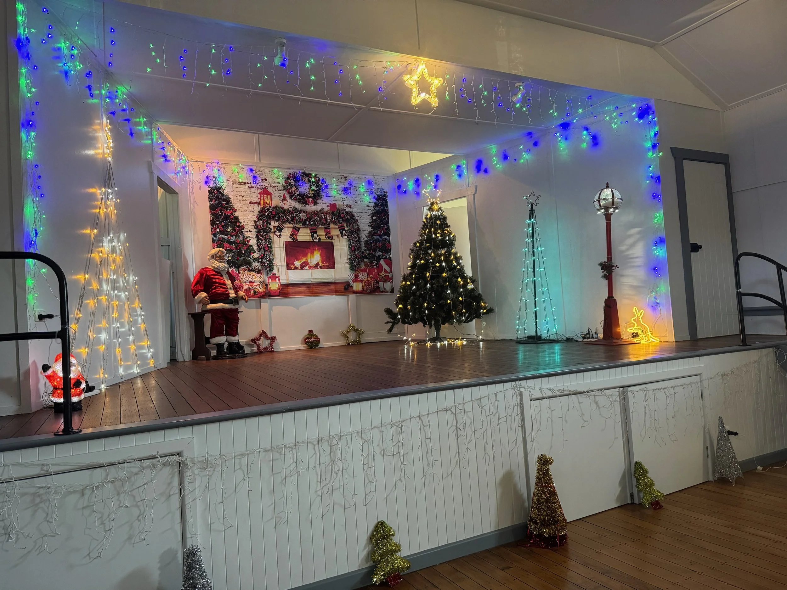 The stage area decked up for a Christmas party