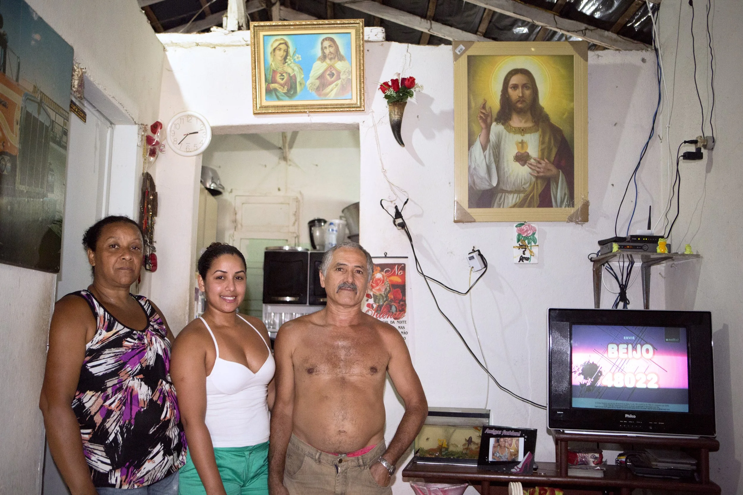 Marciana Oliveira de Menezes and her parents at home 2013.jpg