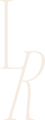 Letters L and R in a monogram with a scrolling effect on top of an image of a woman soft smiling