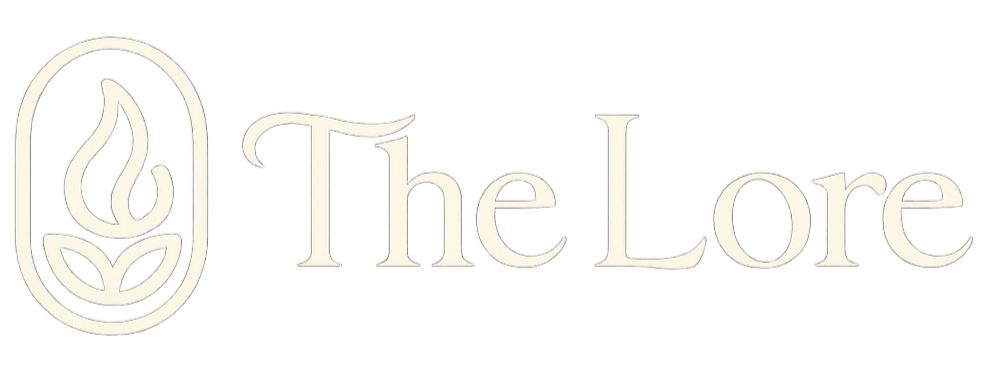 Logo featuring a stylized flame and leaf design next to the text "The Lore" in a serif font.