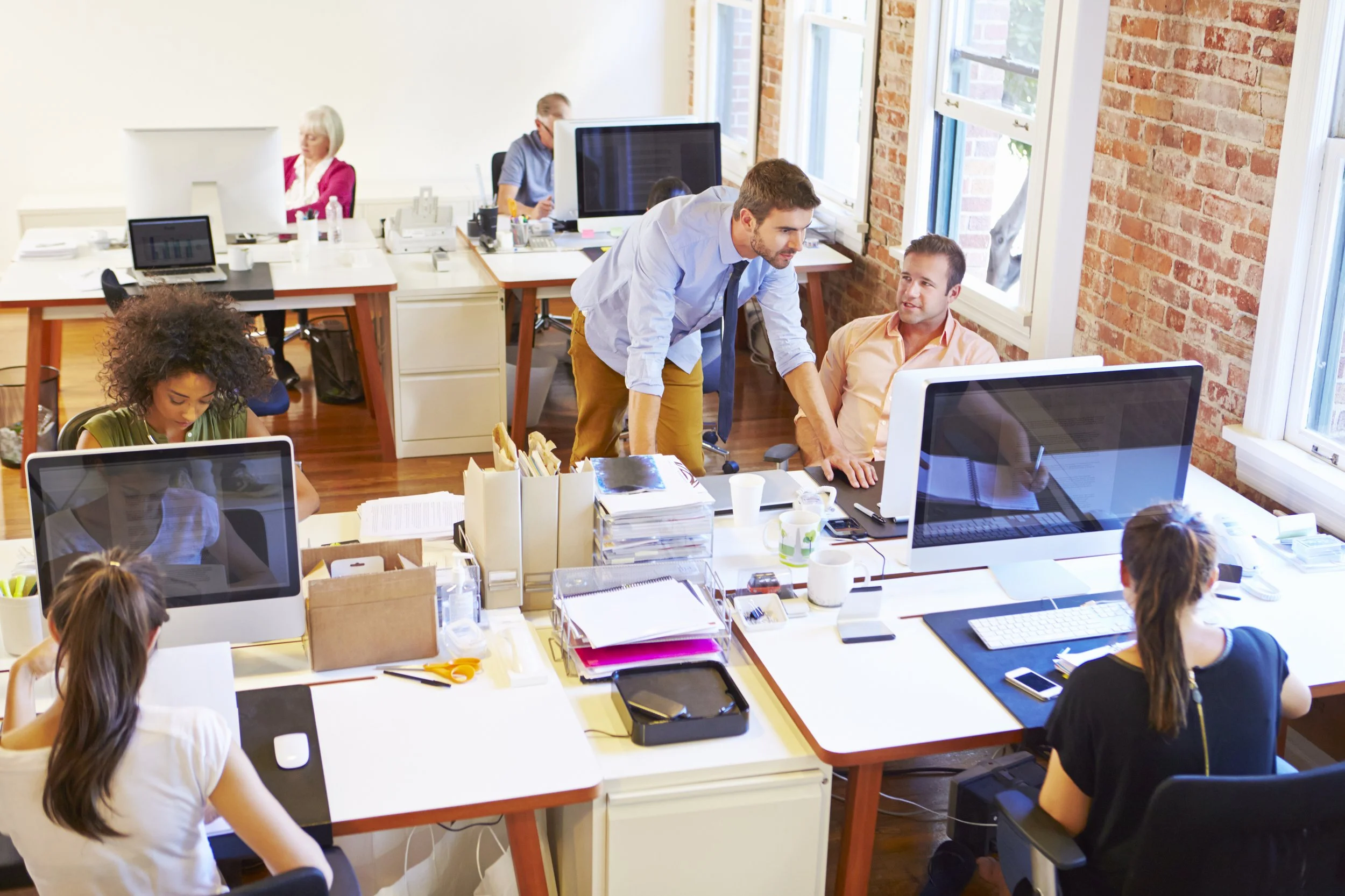 Office setting with collaborating workers