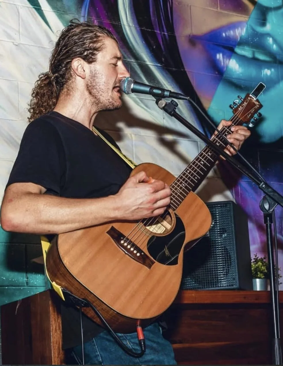 The One Man Band, solo acoustic guitarist and vocalist performing live at a Jackson Entertainment Queensland event