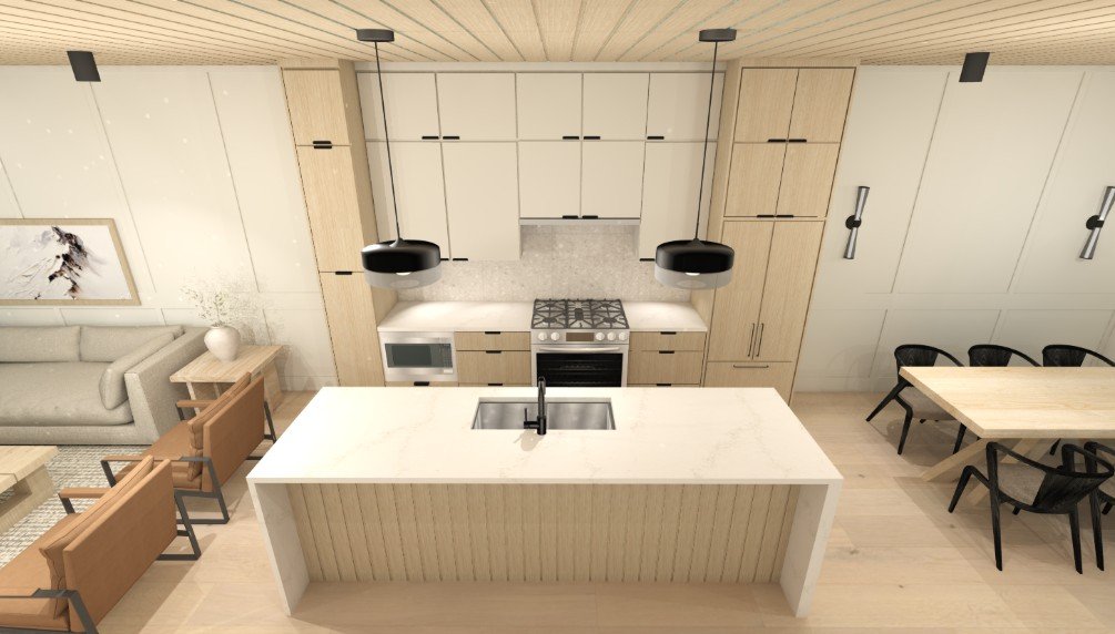 Modern open-concept kitchen with a large white island, light wood cabinetry, black pendant lights, stainless steel appliances, adjacent dining table with black chairs, and a cozy living space with a cream sofa and artwork.