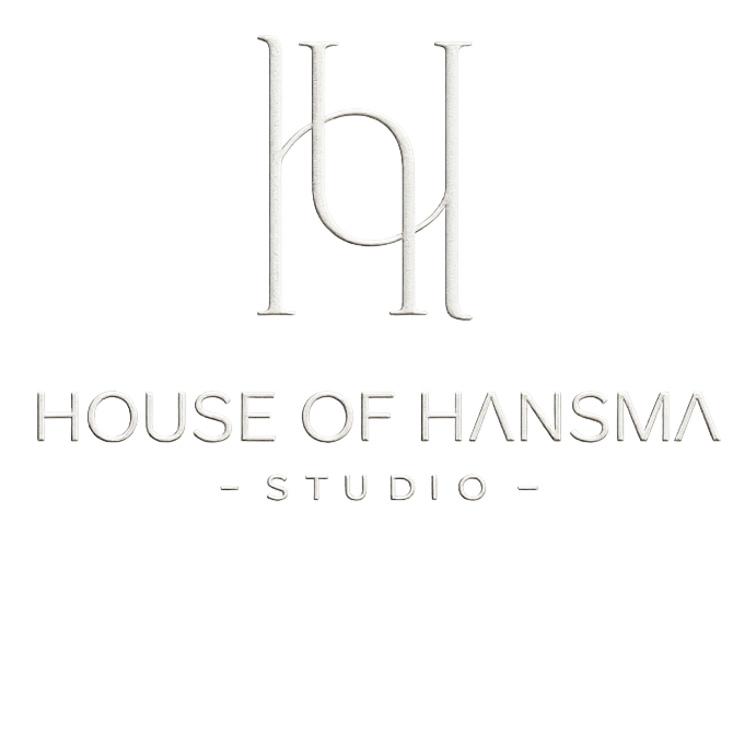 Logo for House of Hansma Studio featuring stylized H and H letters in silver on black background