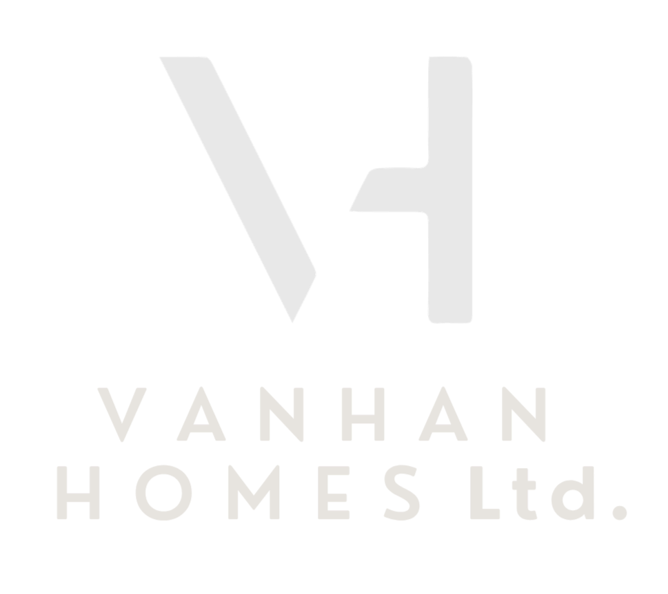 V4 Vanhan Homes Ltd. logo with stylized V and H in gray on a black background.