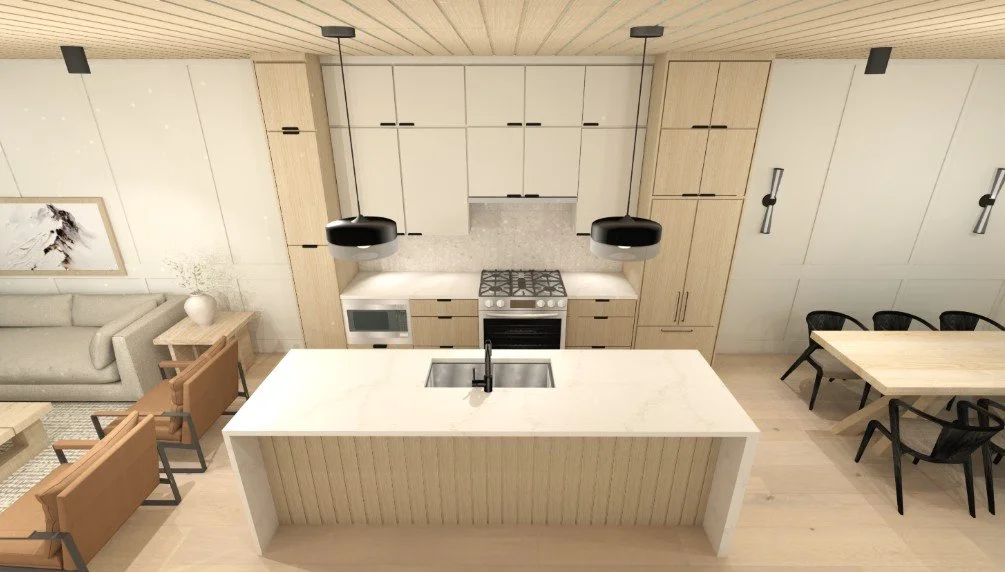 Modern kitchen with a large island, light wood cabinets, built-in oven, microwave, and a dining area with black chairs.