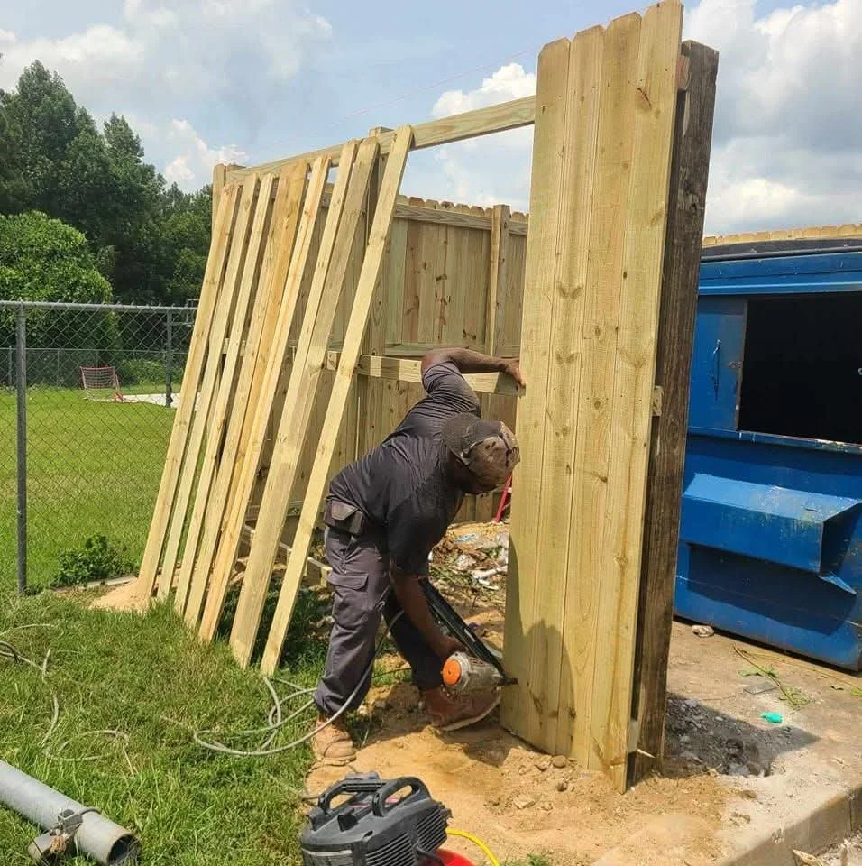 Oranssi carpenter using bench saw
