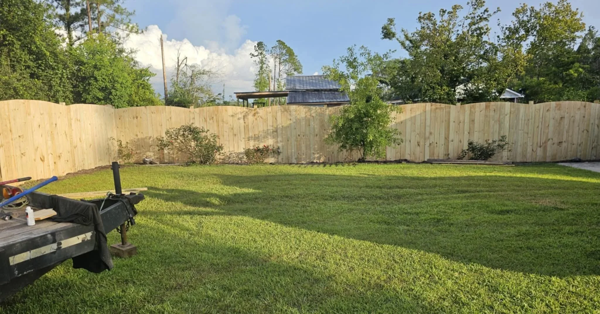 Oranssi technician working on a roof project