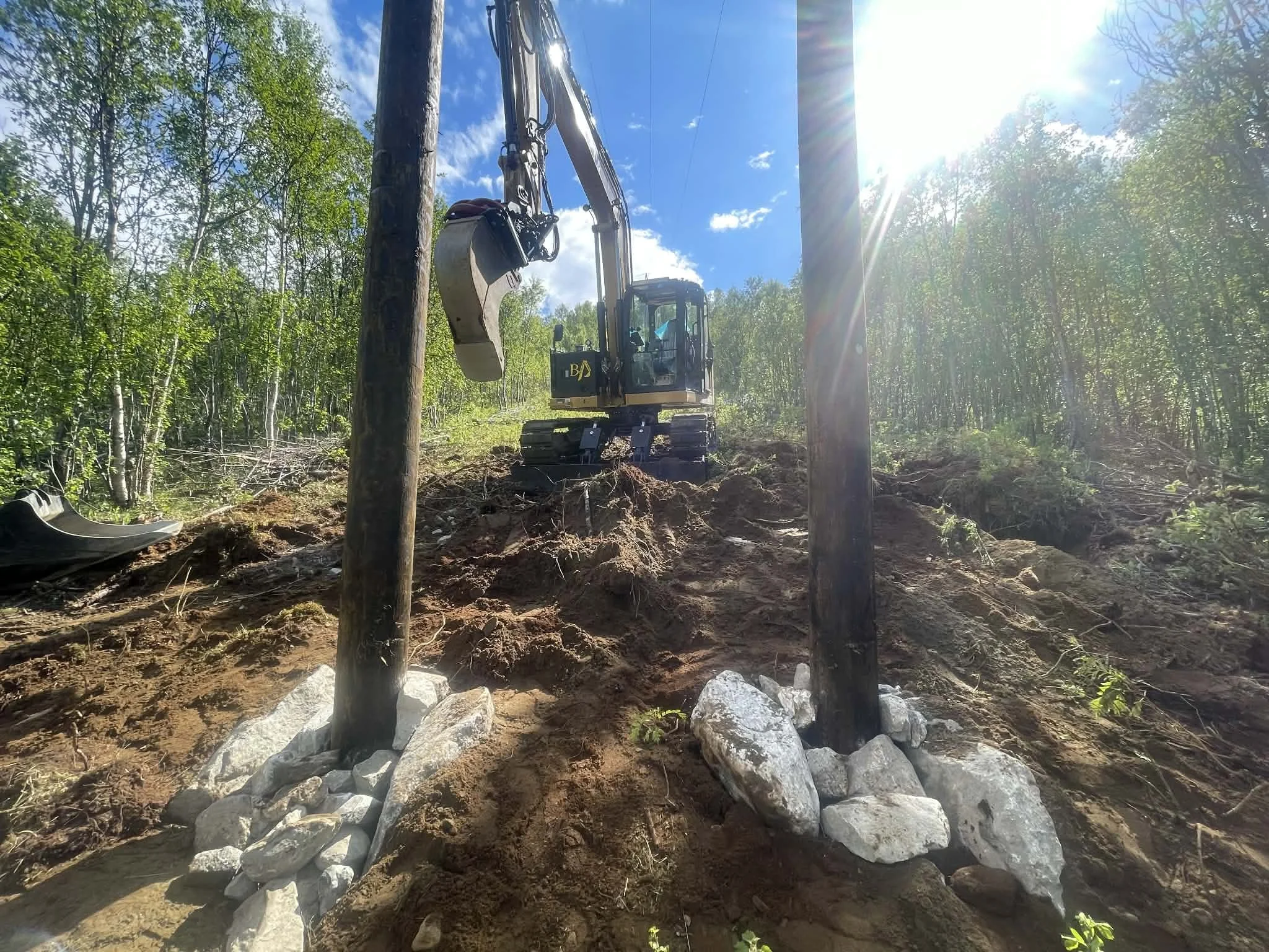 Linjebygging med gravemaskin