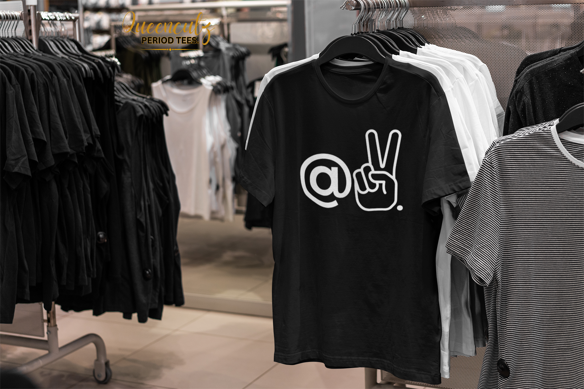 mockup-featuring-a-t-shirt-hanging-by-other-garments-at-a-store-3708-el1.png