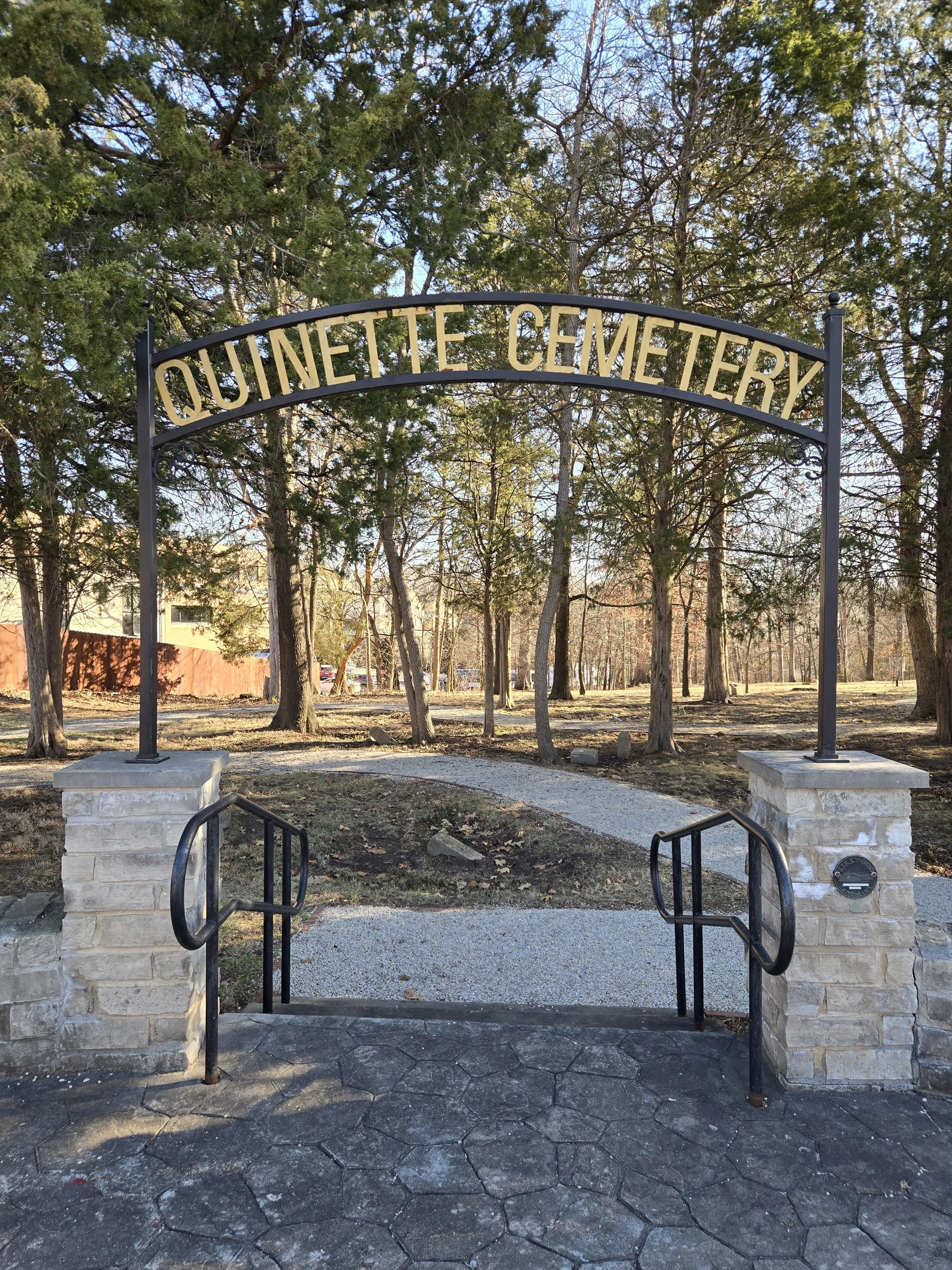 Entry gate and walking path at Quinette Cemetery in Kirkwood, MO