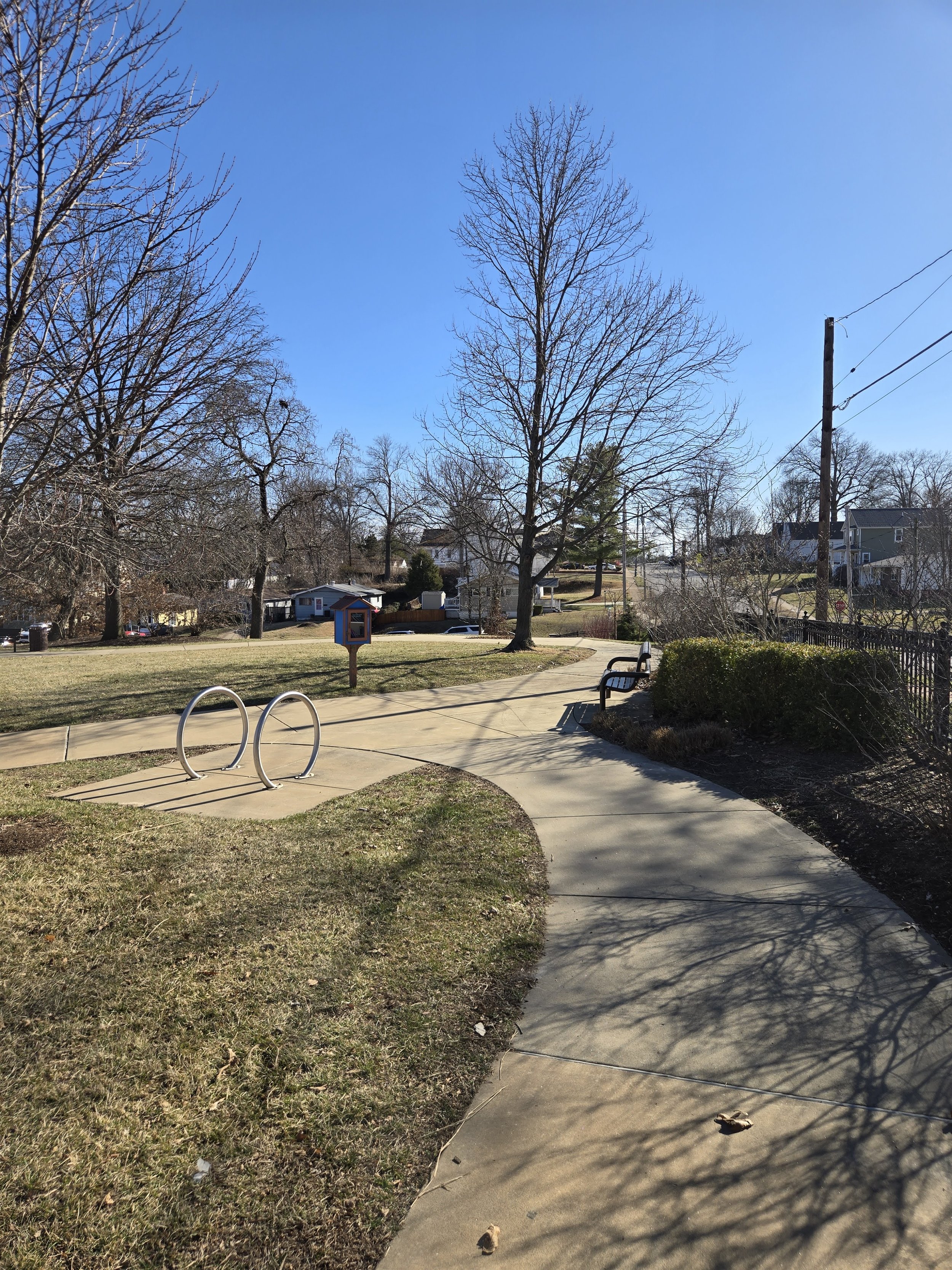 Walking Path, Little Library, Bike Rack, and Seating Bench at Fillmore Park in Kirkwood, MO