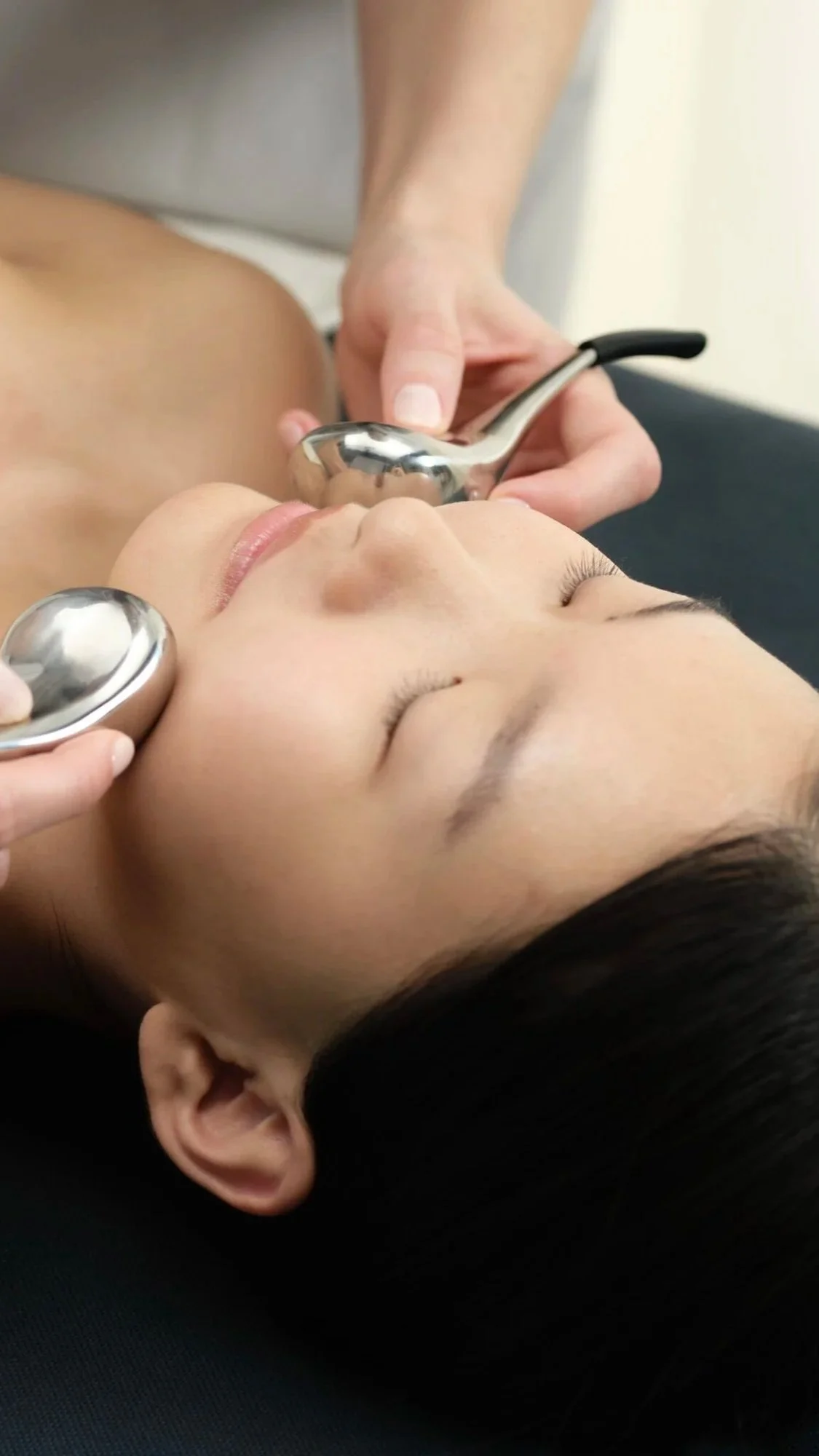 comfort zone facial using cryotherapy spoons to firm and tone the skin