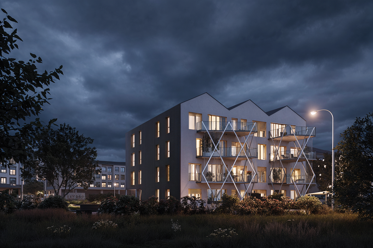 Edificio residencial moderno en la noche con iluminación interior y estructura metálica en forma de hexágono en los balcones, rodeado de jardines y árboles.