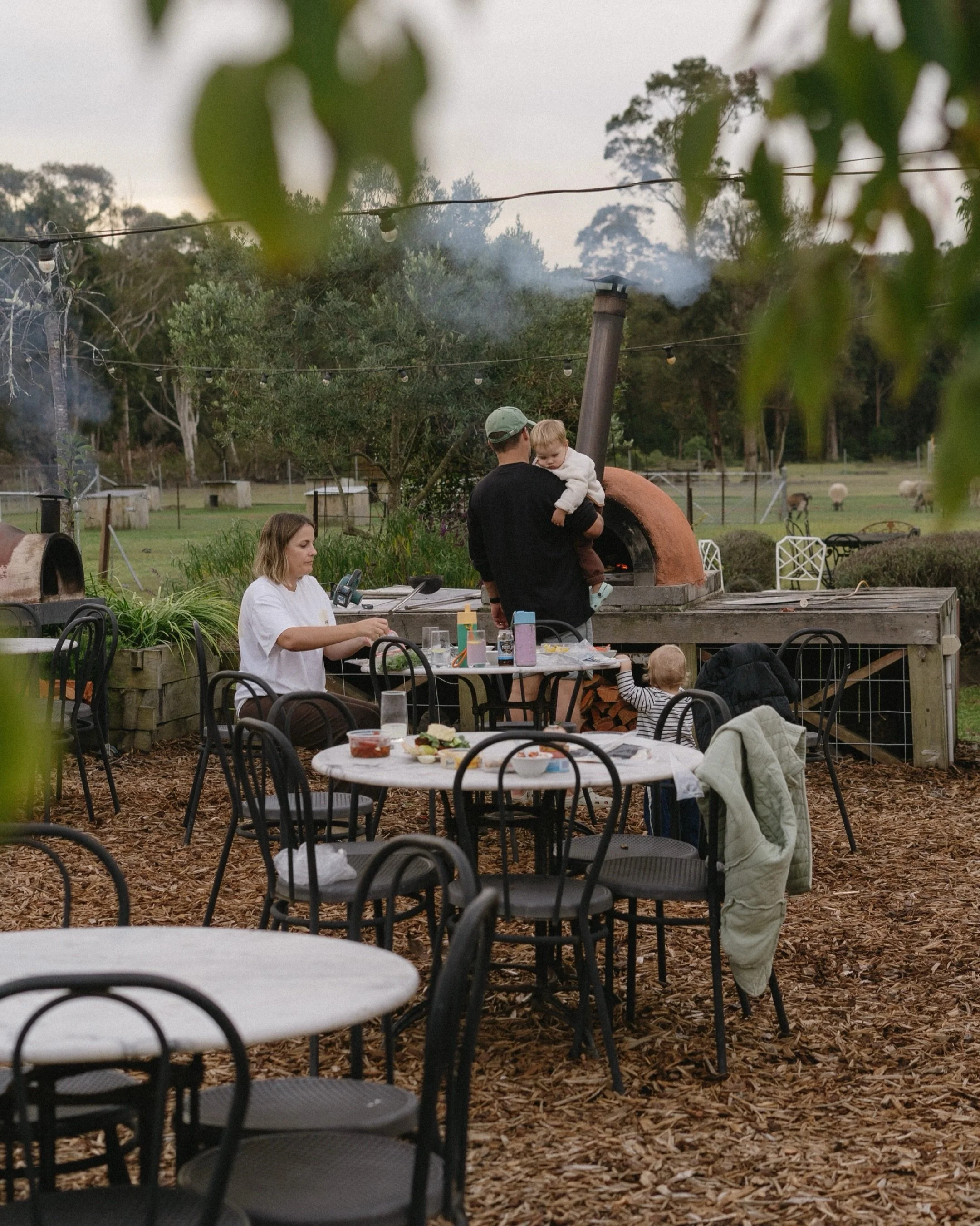 Pizza night in the communal gardens. Such a lovely (and delicious) way to spend the afternoon with the kids. 

@thewoodsfarmjervisbay_ 
@maywild.venues 
@visitnswsouthcoast 

#pizzanight #gardens #familydinner #lifestylephotography #familyphotography
