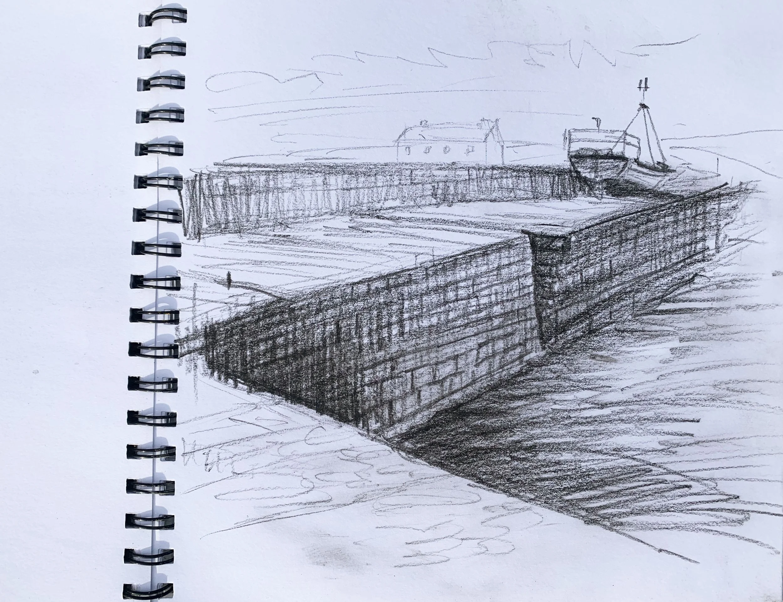 Sandside harbour is one of many interesting stone built harbours around Caithness. It has two L shaped piers, with walkways made with large heavy flagstones, surfaces now uneven with wear, mottled with lichens and edges 